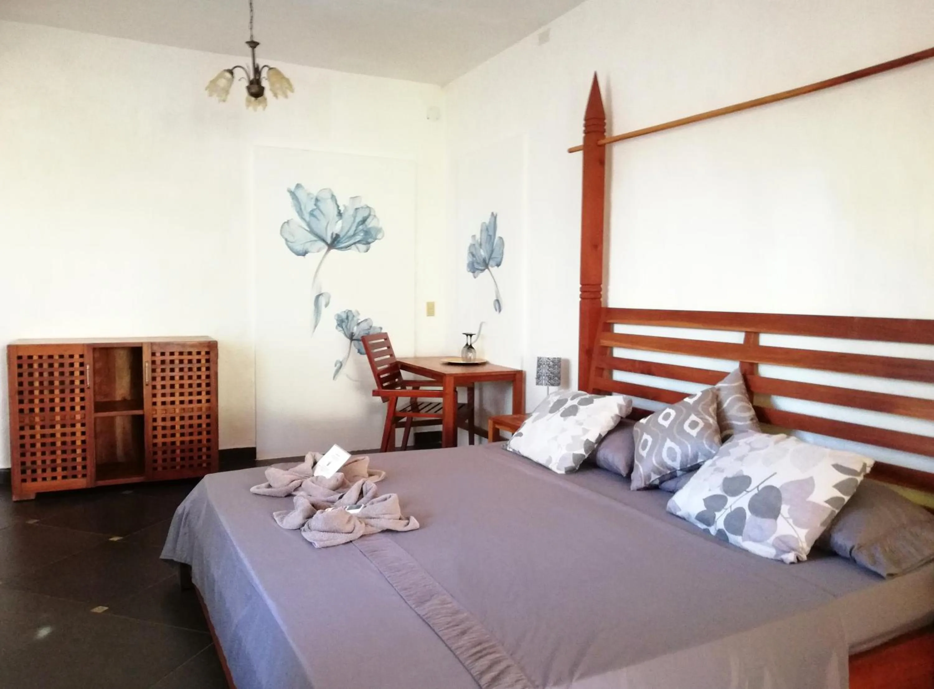 Bed in Punta Duarte Garden Inn