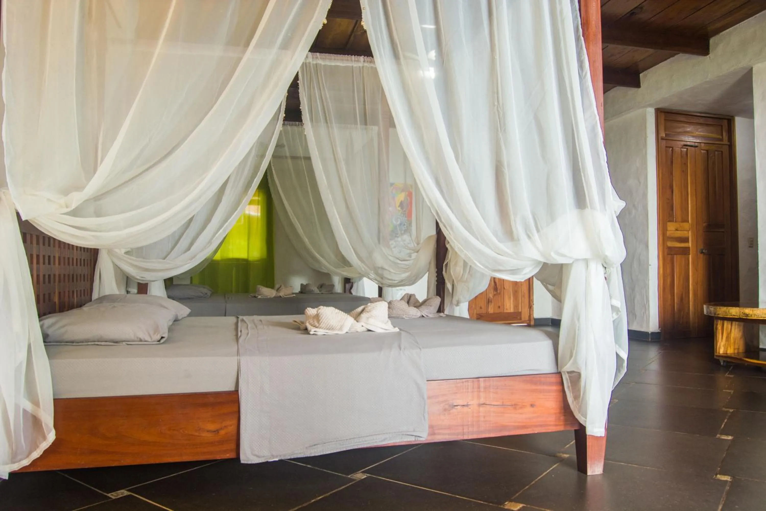 Bed in Punta Duarte Garden Inn