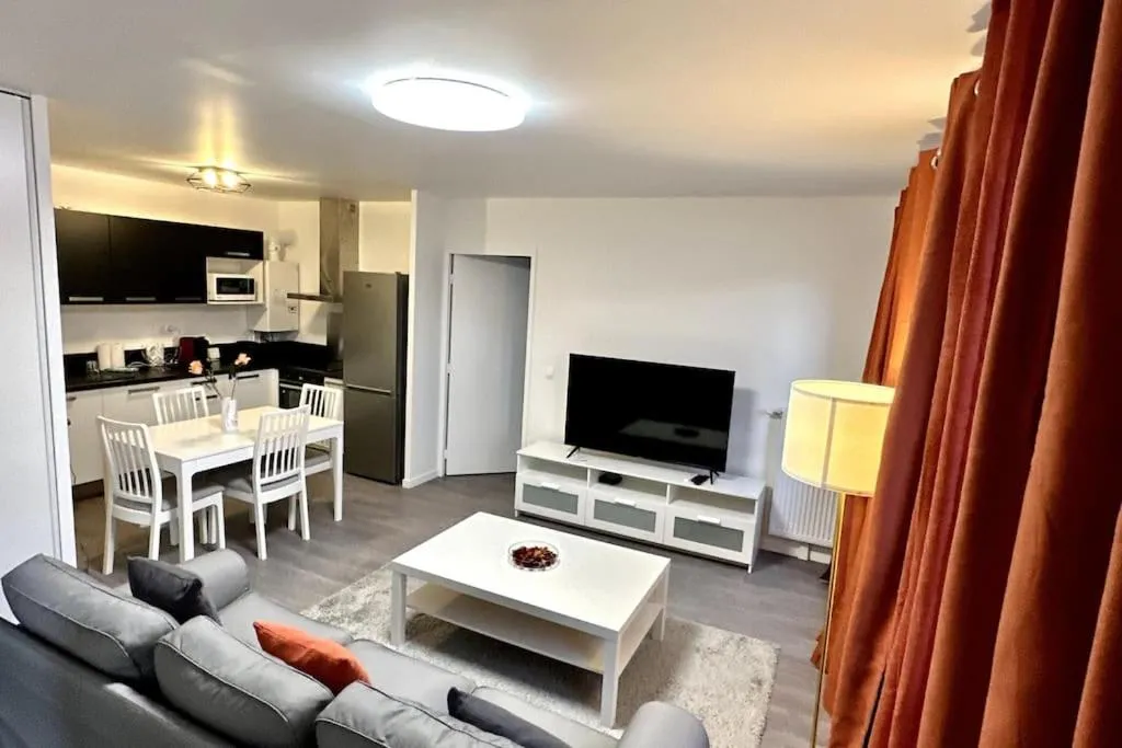 Living room in Appartement Cozy - Quartier résidentiel