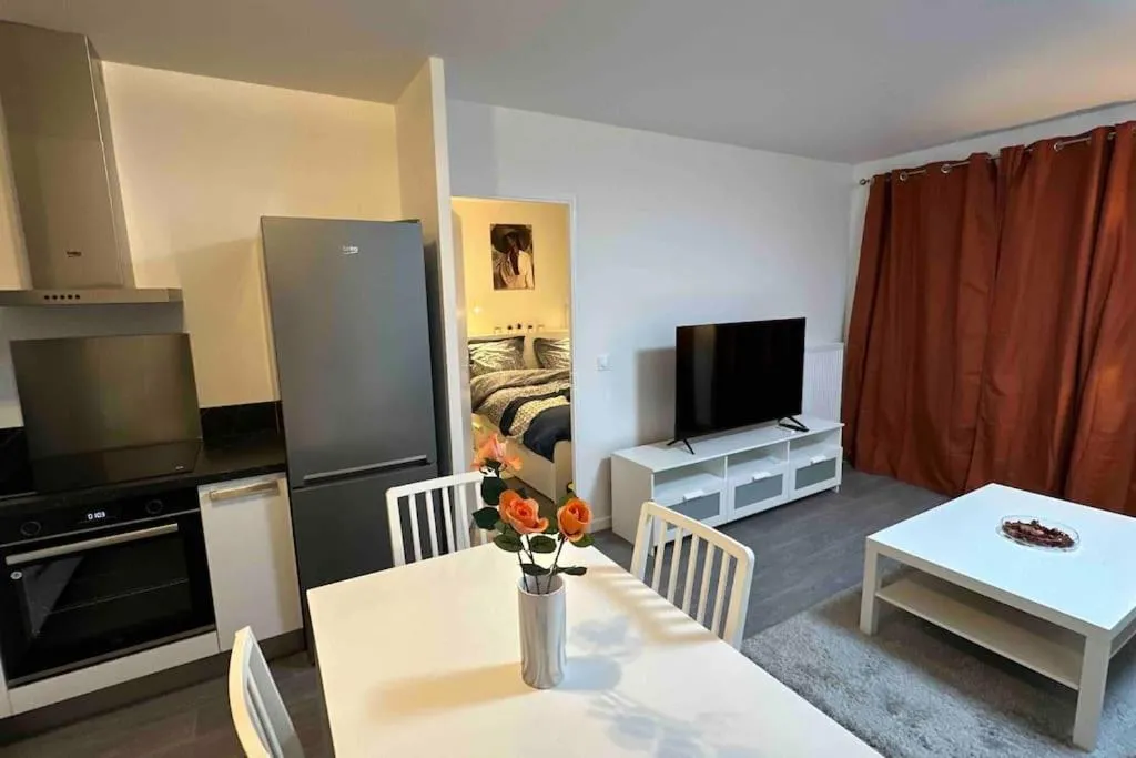 Kitchen or kitchenette in Appartement Cozy - Quartier résidentiel