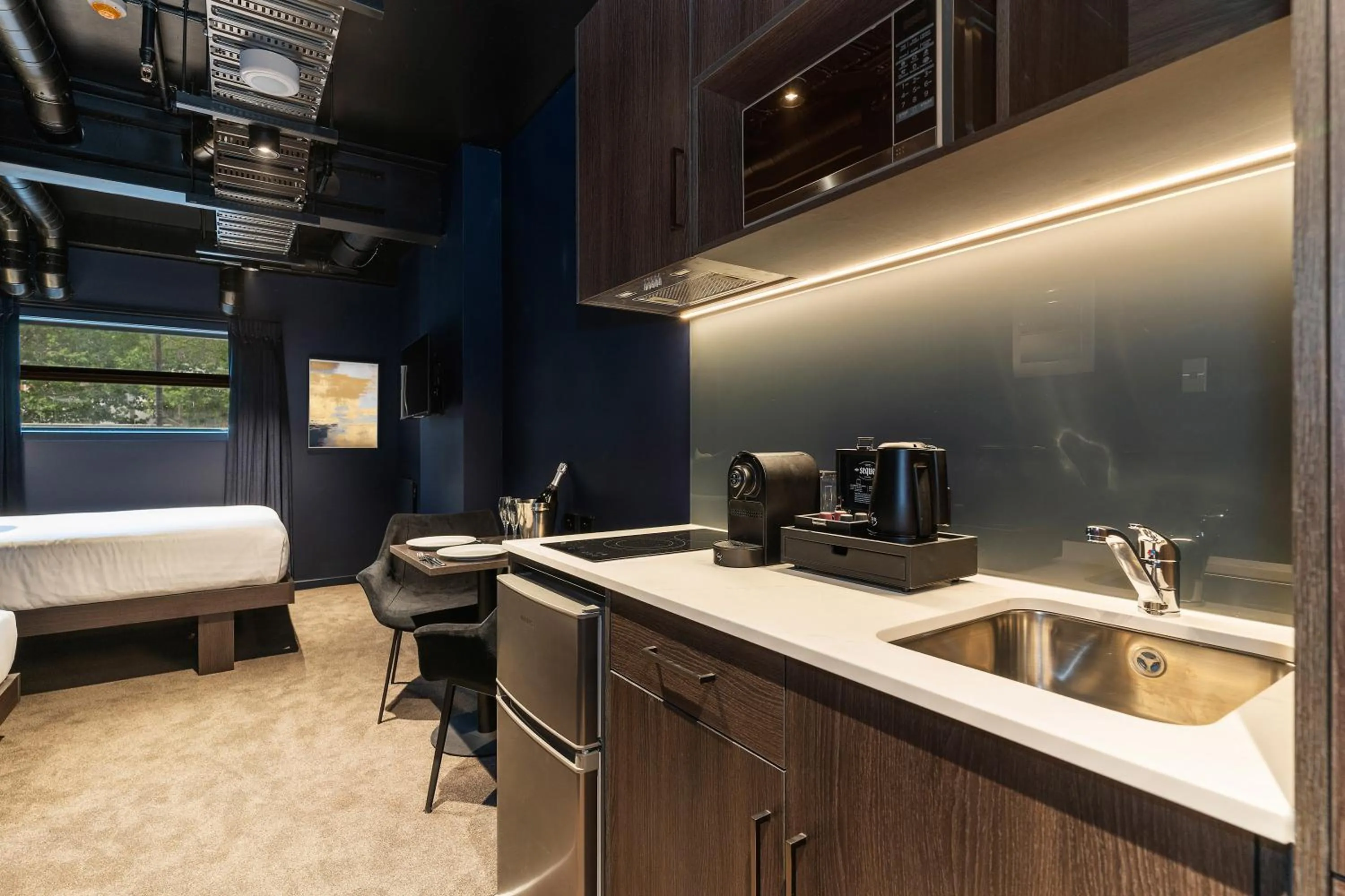 Kitchen or kitchenette, Bed in Abstract Hotel