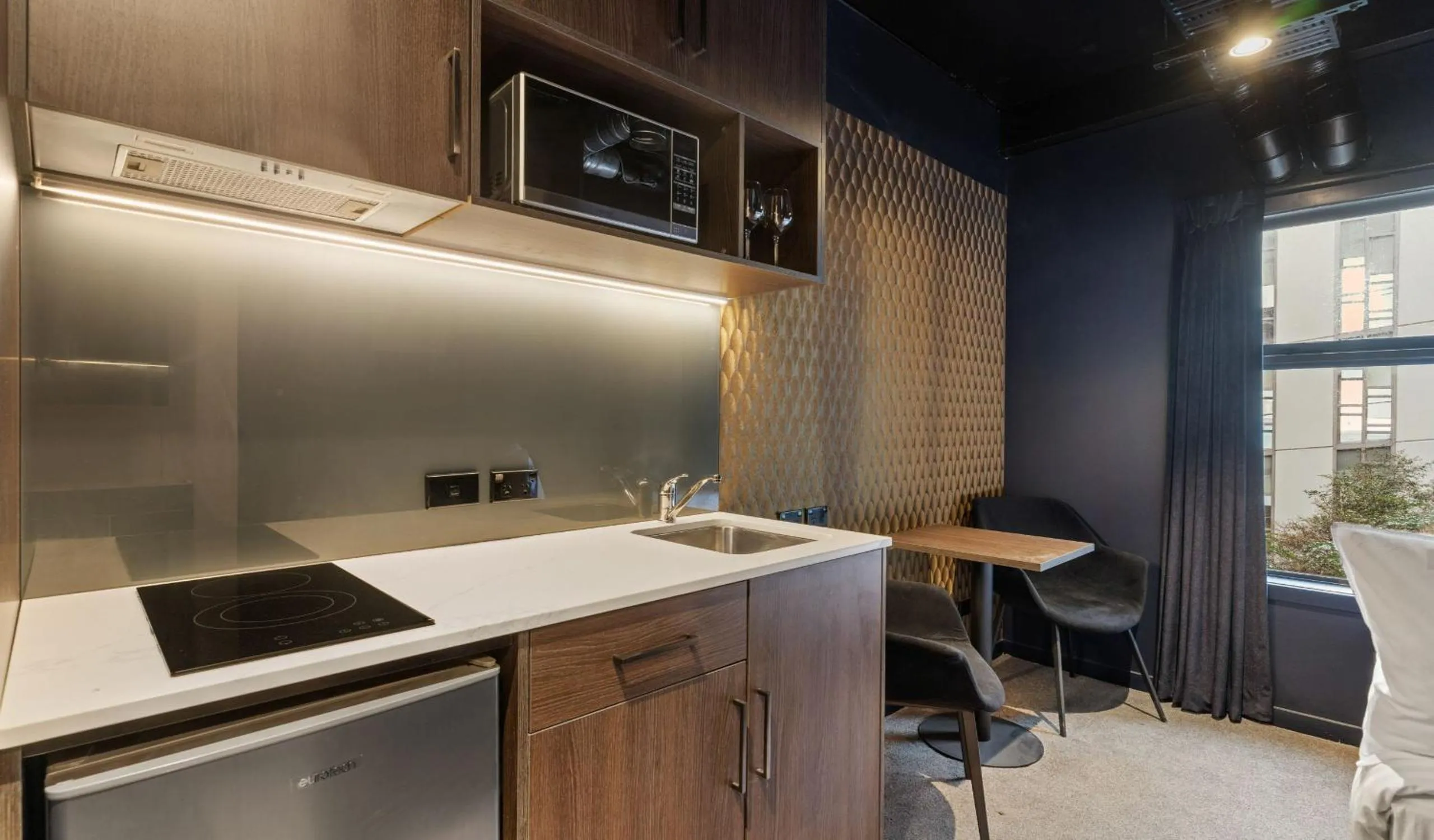 Kitchen or kitchenette in Abstract Hotel
