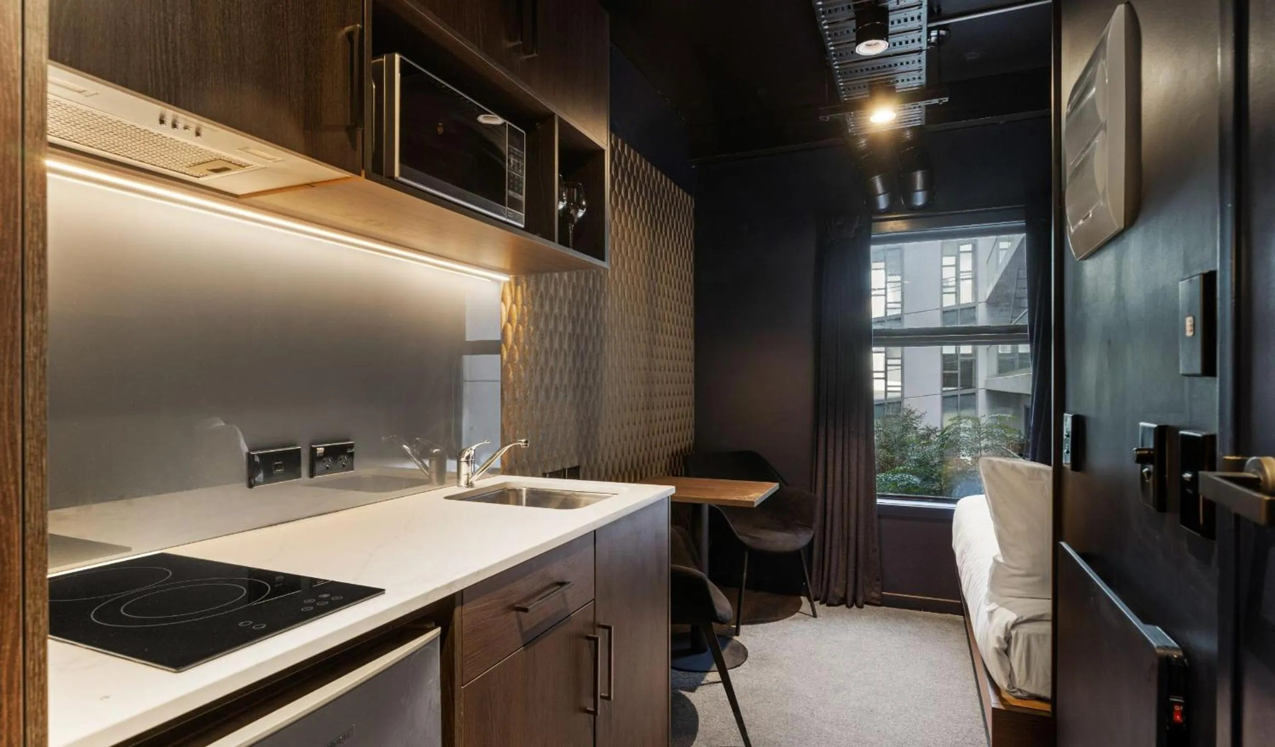 Kitchen or kitchenette in Abstract Hotel