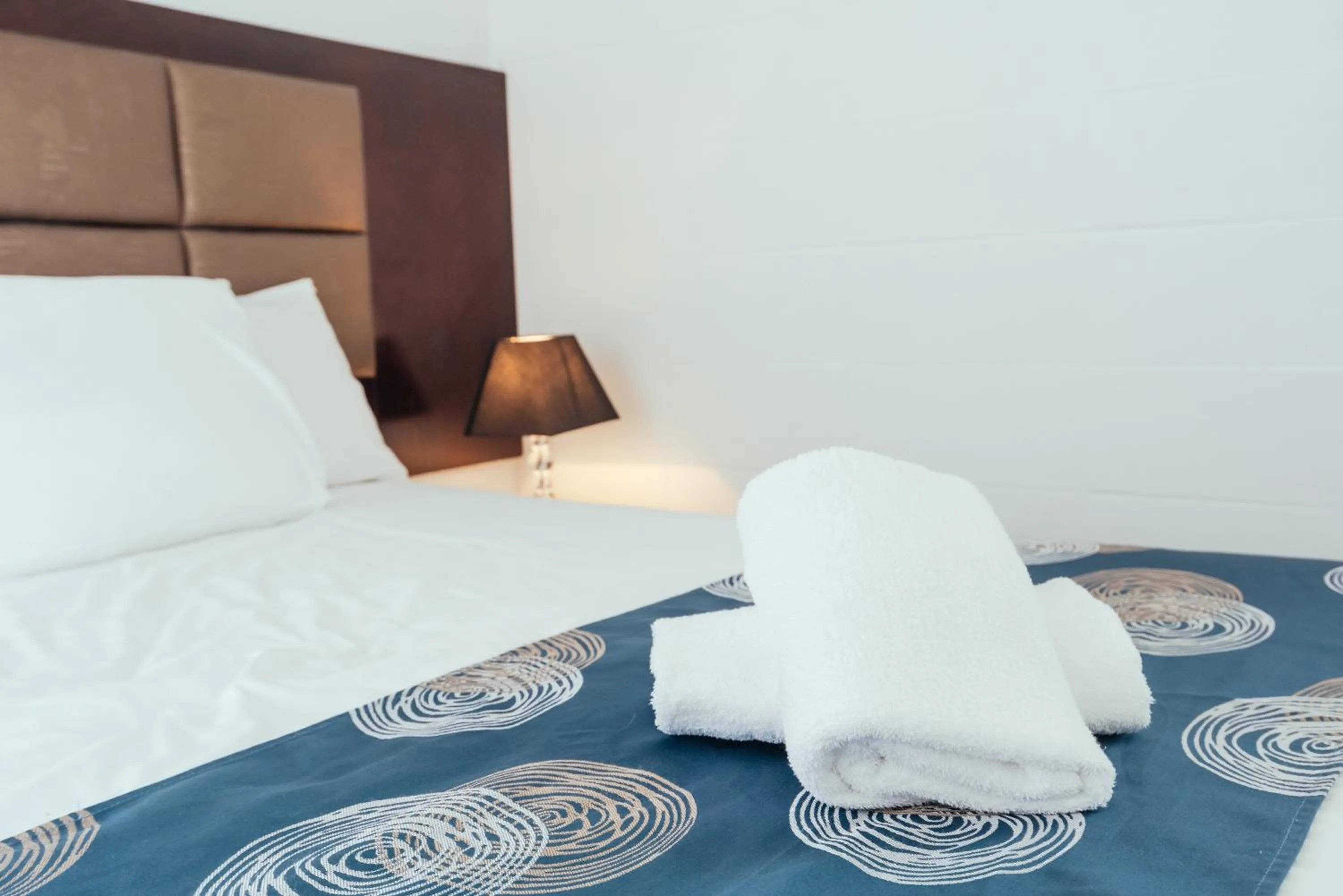 Bed in Coffs Windmill Motel