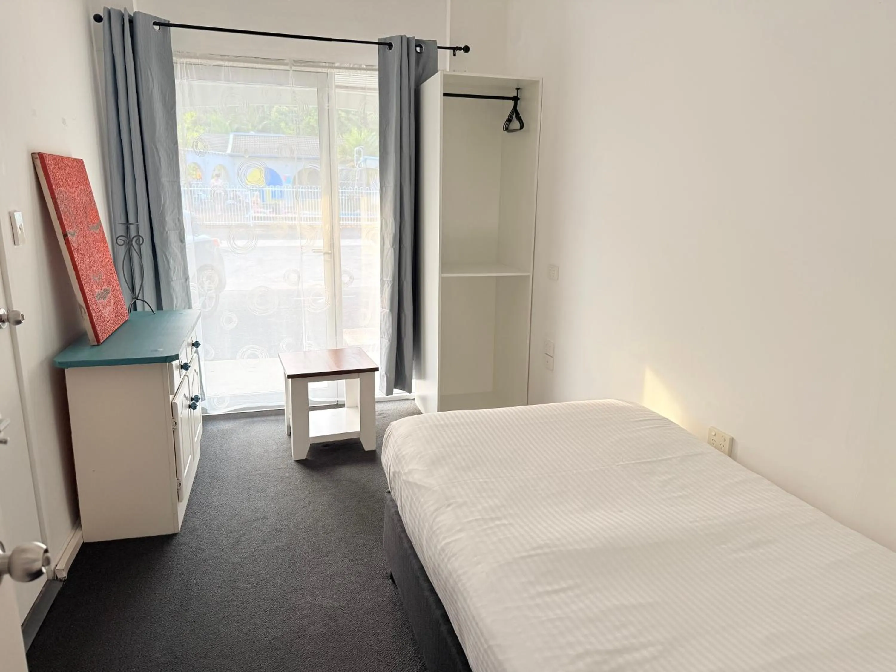 Bed in Coffs Windmill Motel