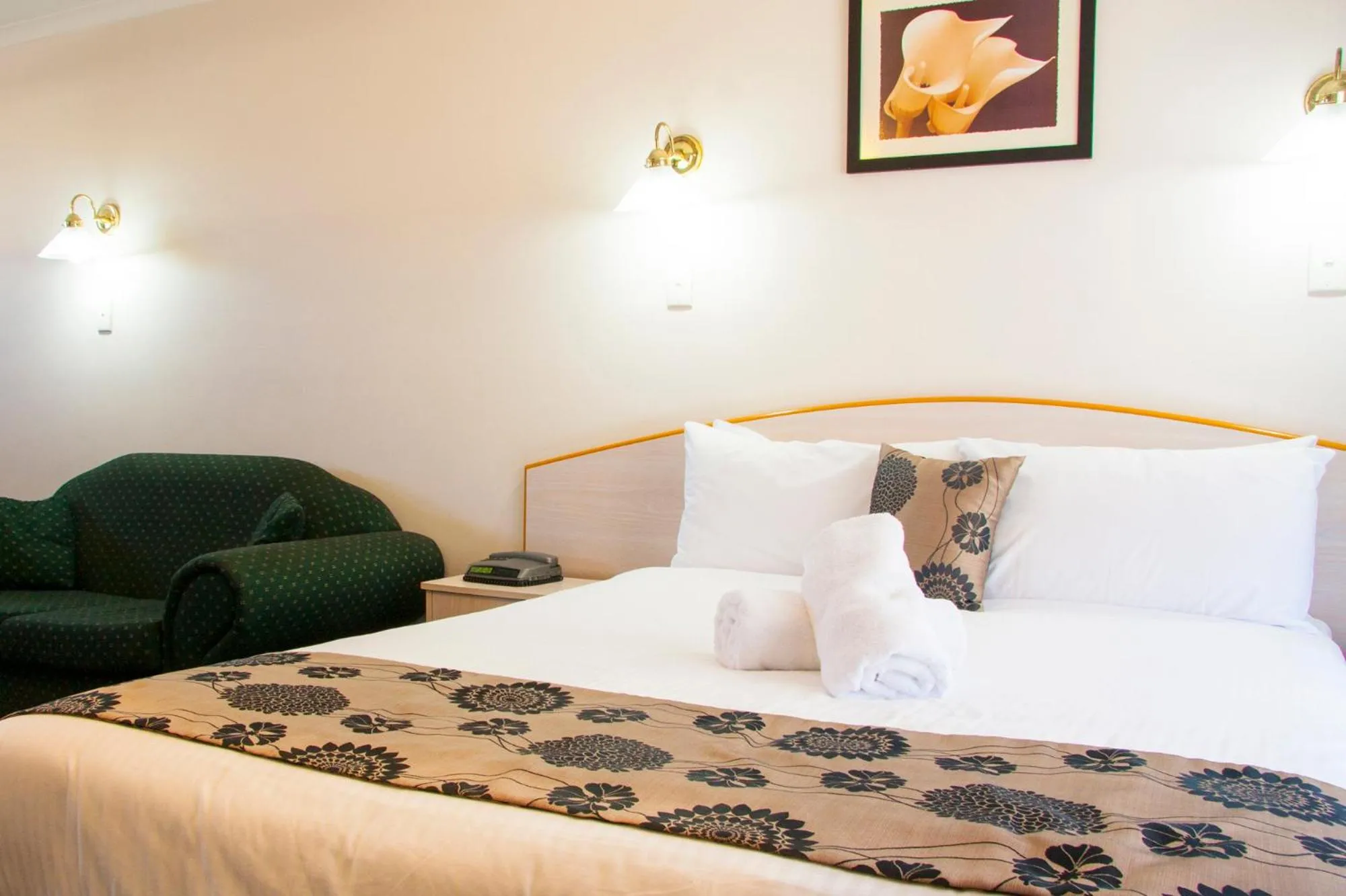 Bed in Coffs Windmill Motel