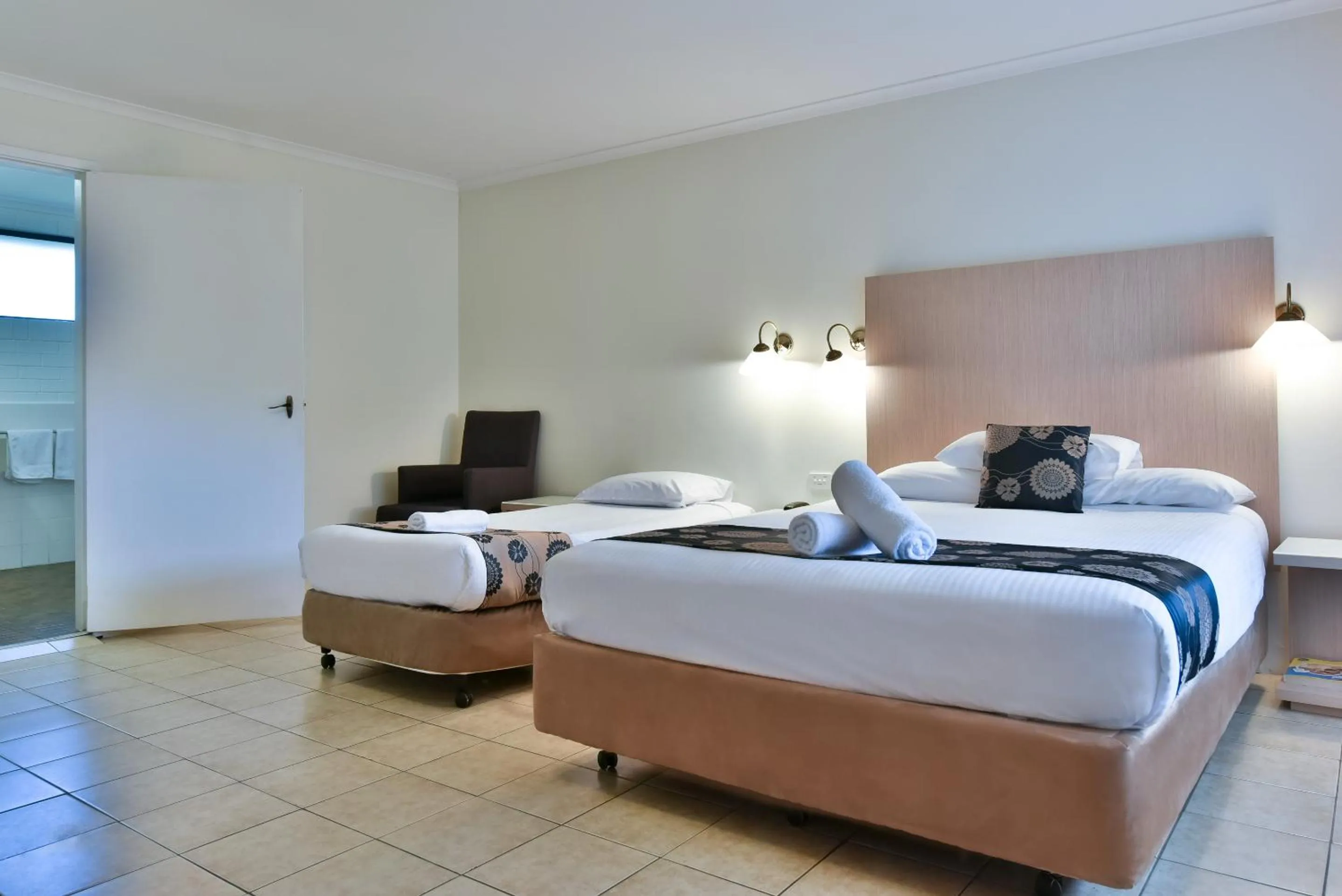 Bed in Coffs Windmill Motel