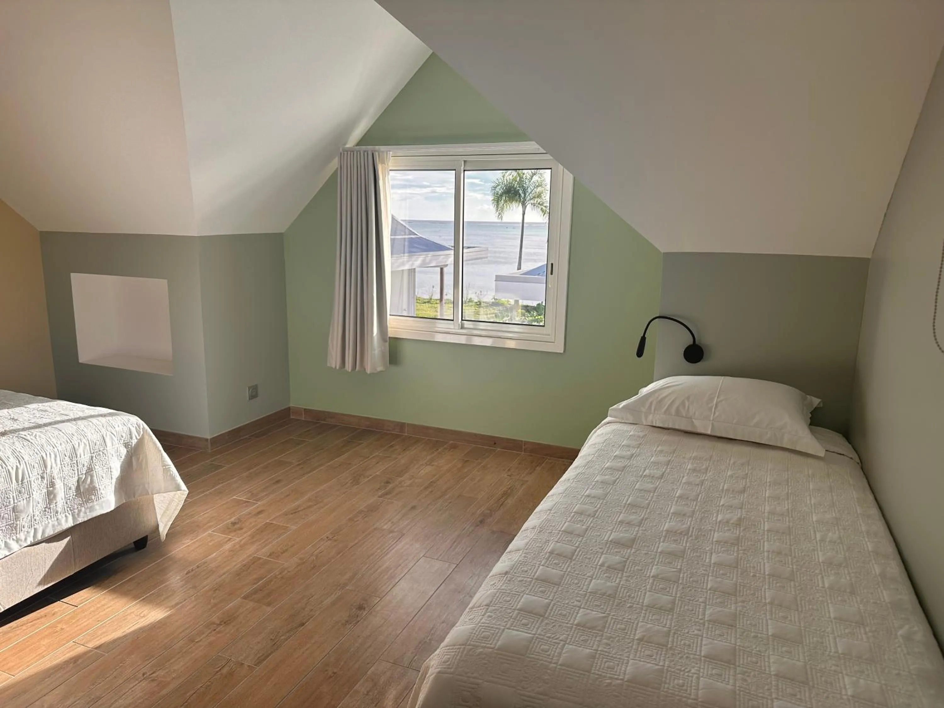 View (from property/room), Bed in Niu Beach Hôtel Moorea