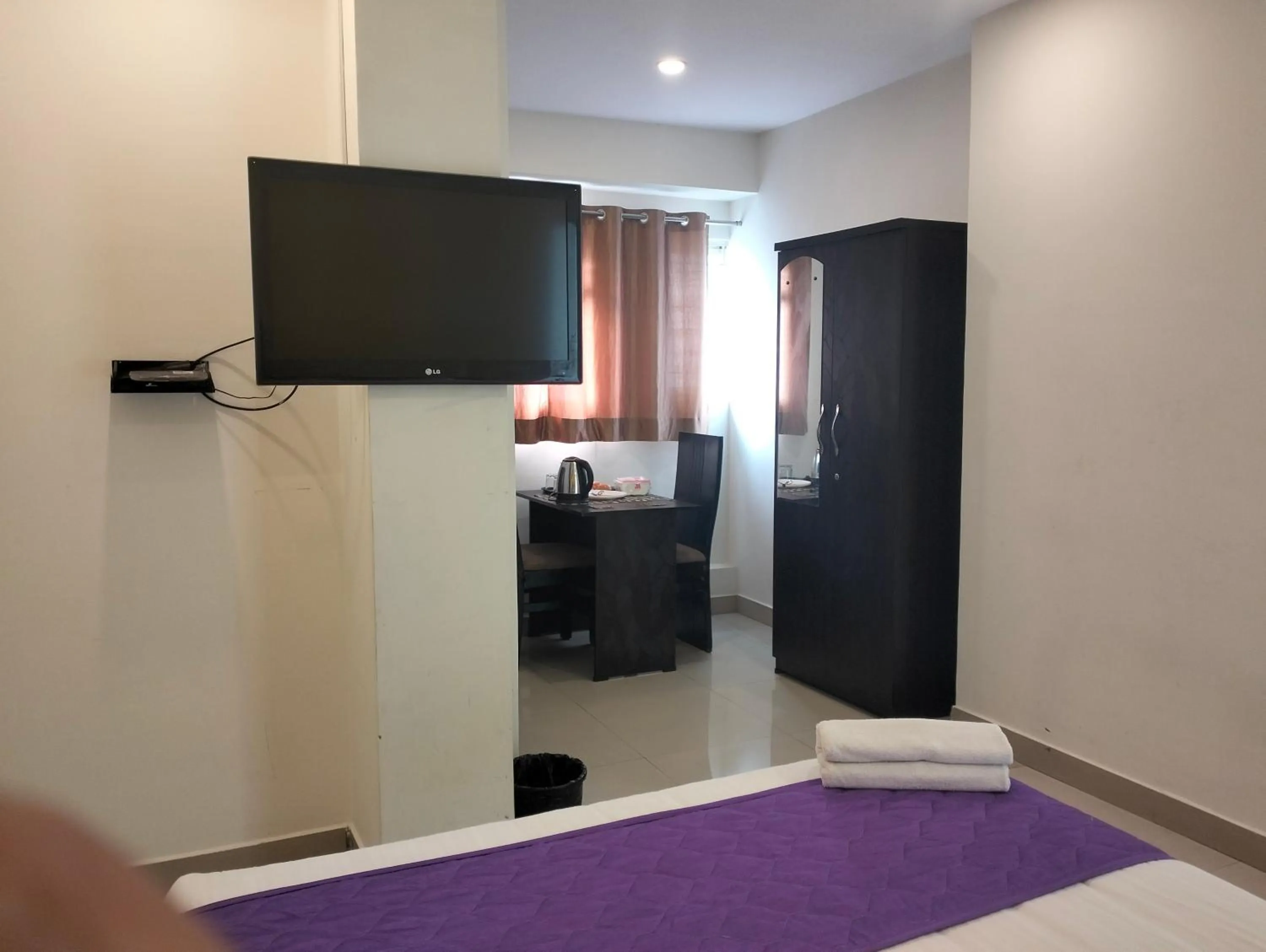 Property building, Bed in Hotel SY Comforts