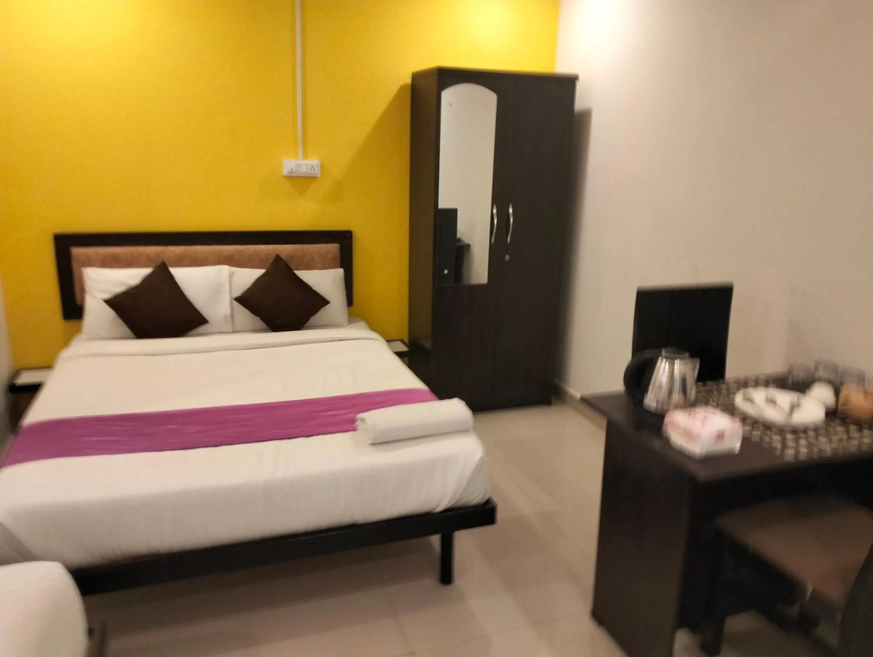 Property building, Bed in Hotel SY Comforts
