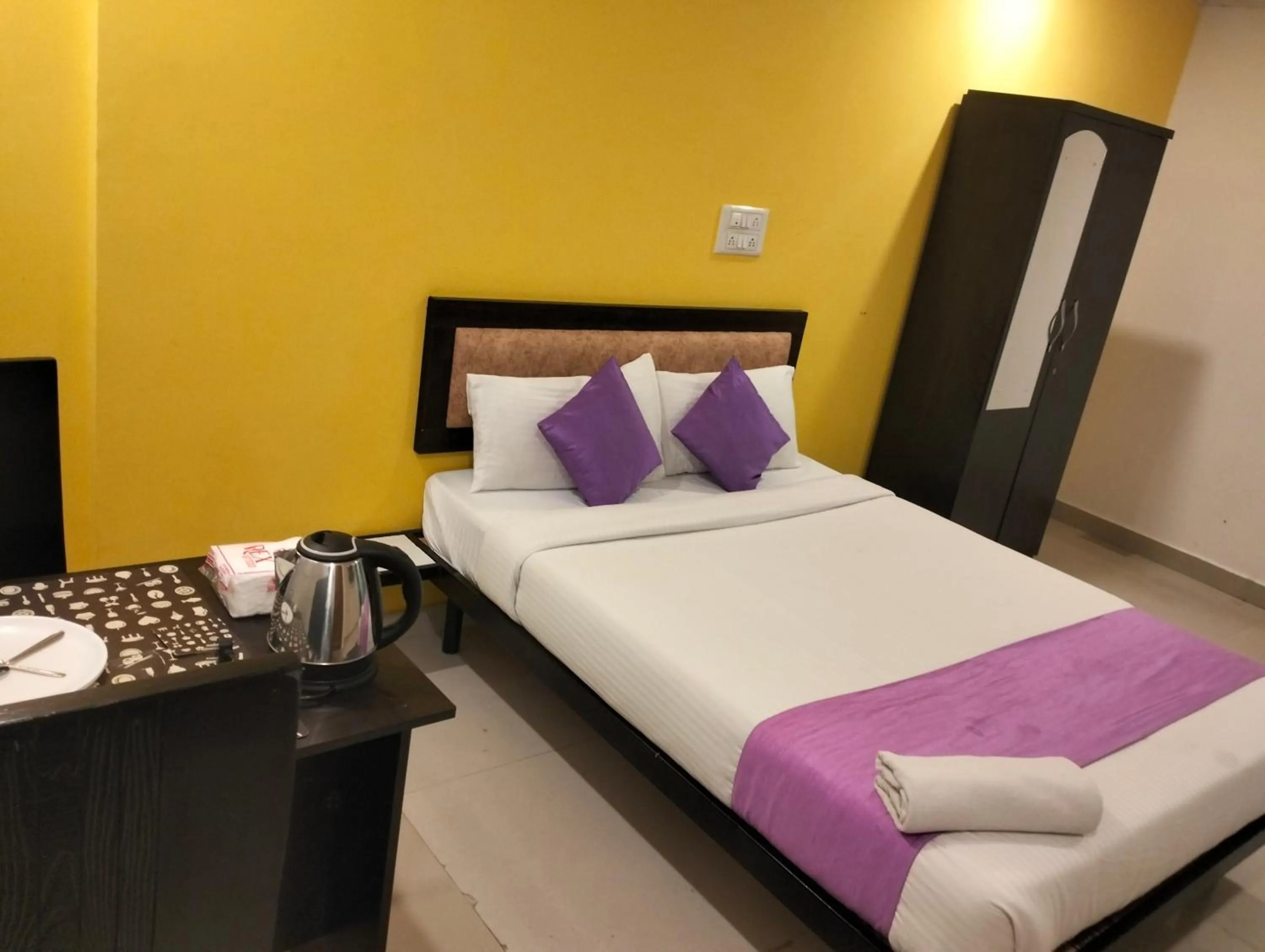 Bed in Hotel SY Comforts