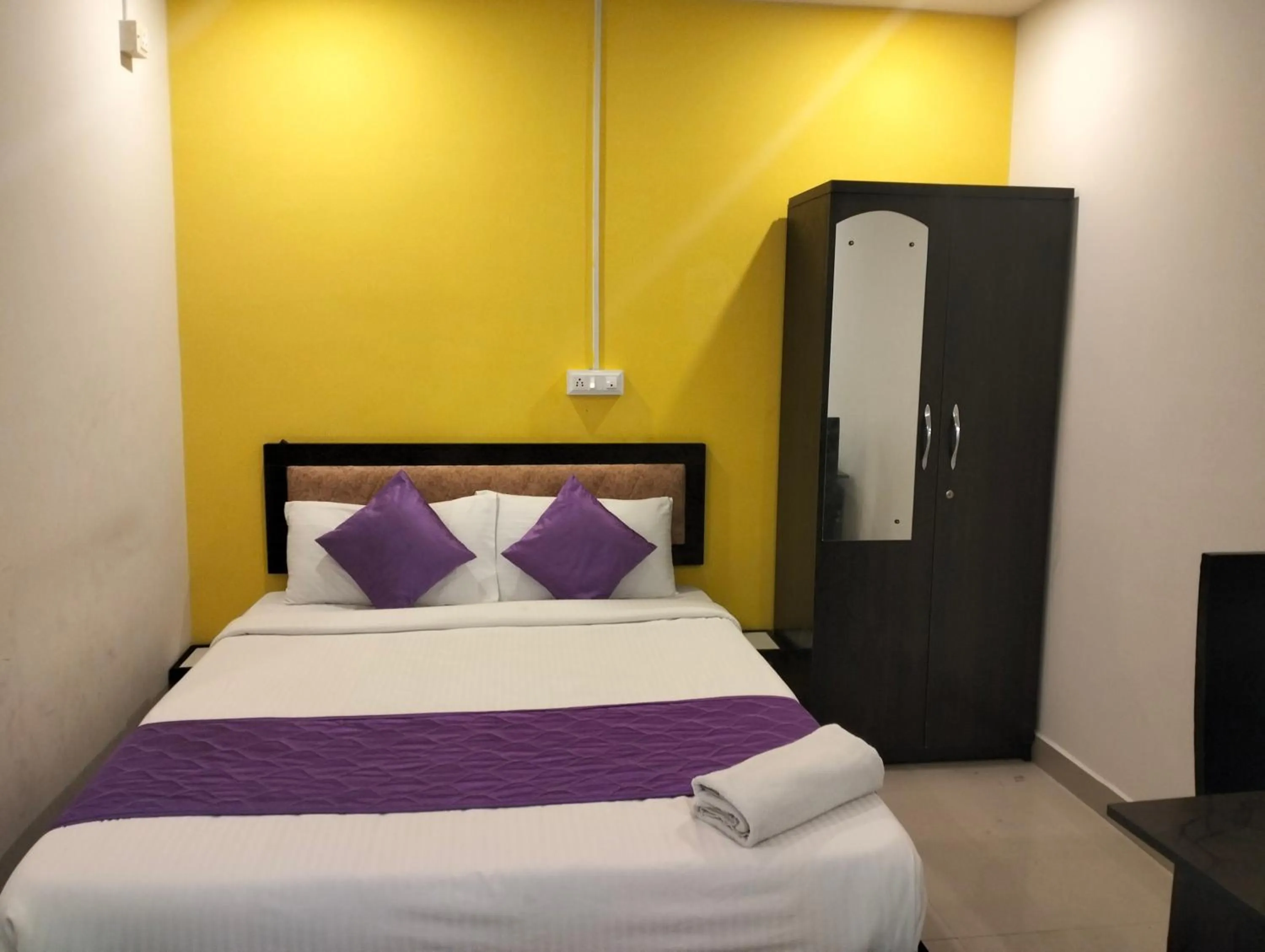 Bed in Hotel SY Comforts