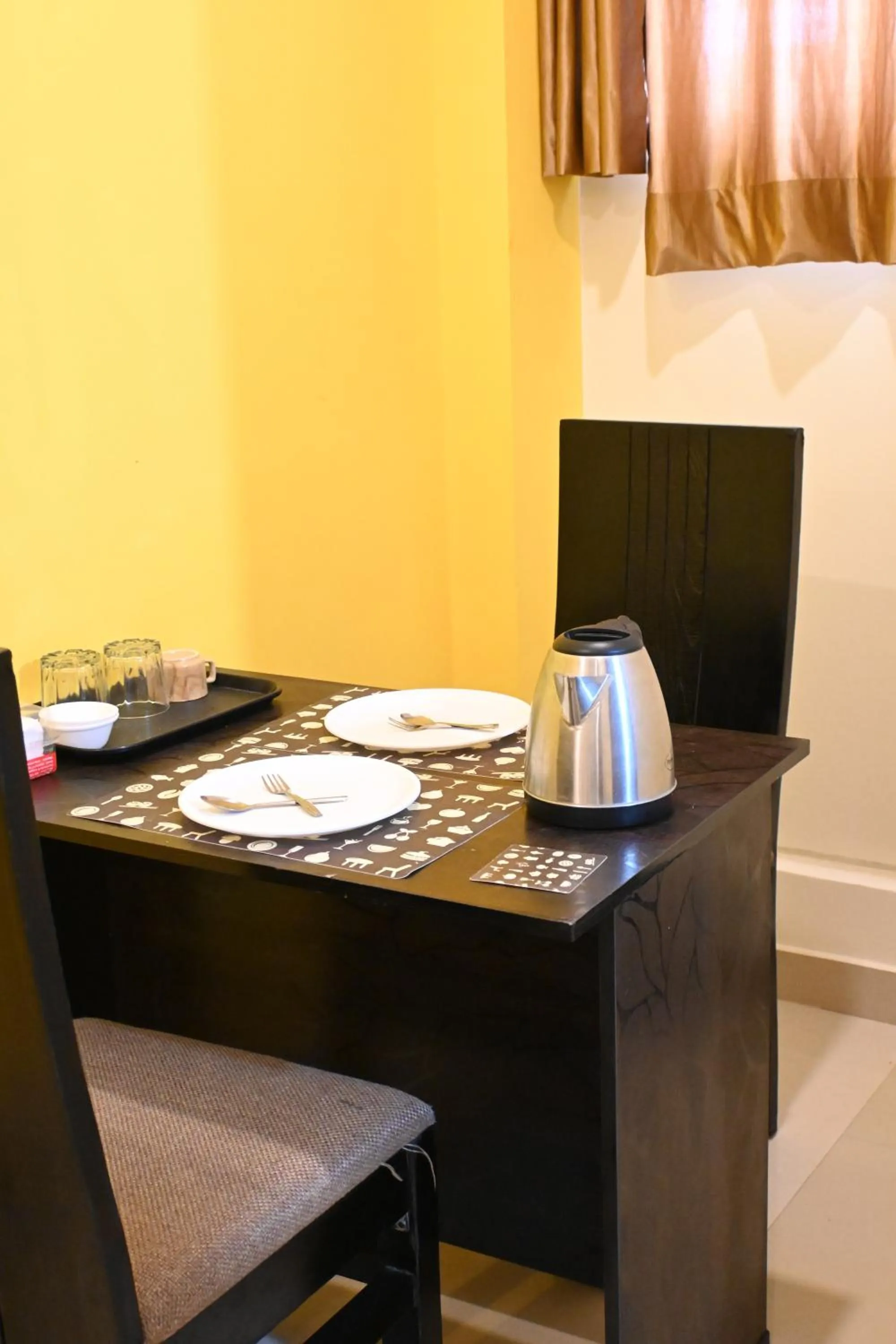 Dining area in Hotel SY Comforts