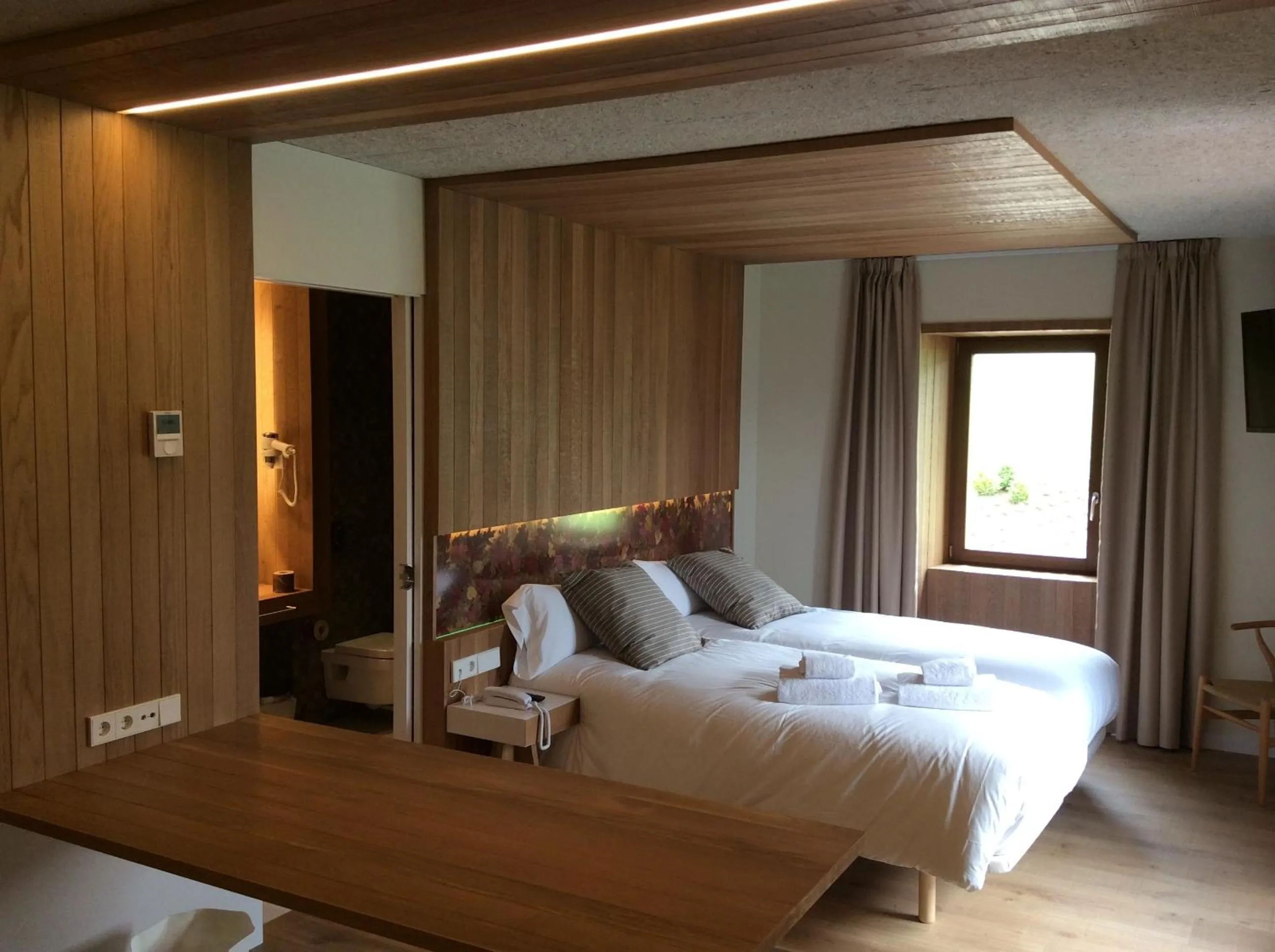 Photo of the whole room, Bed in Palacio de Yrisarri by IrriSarri Land