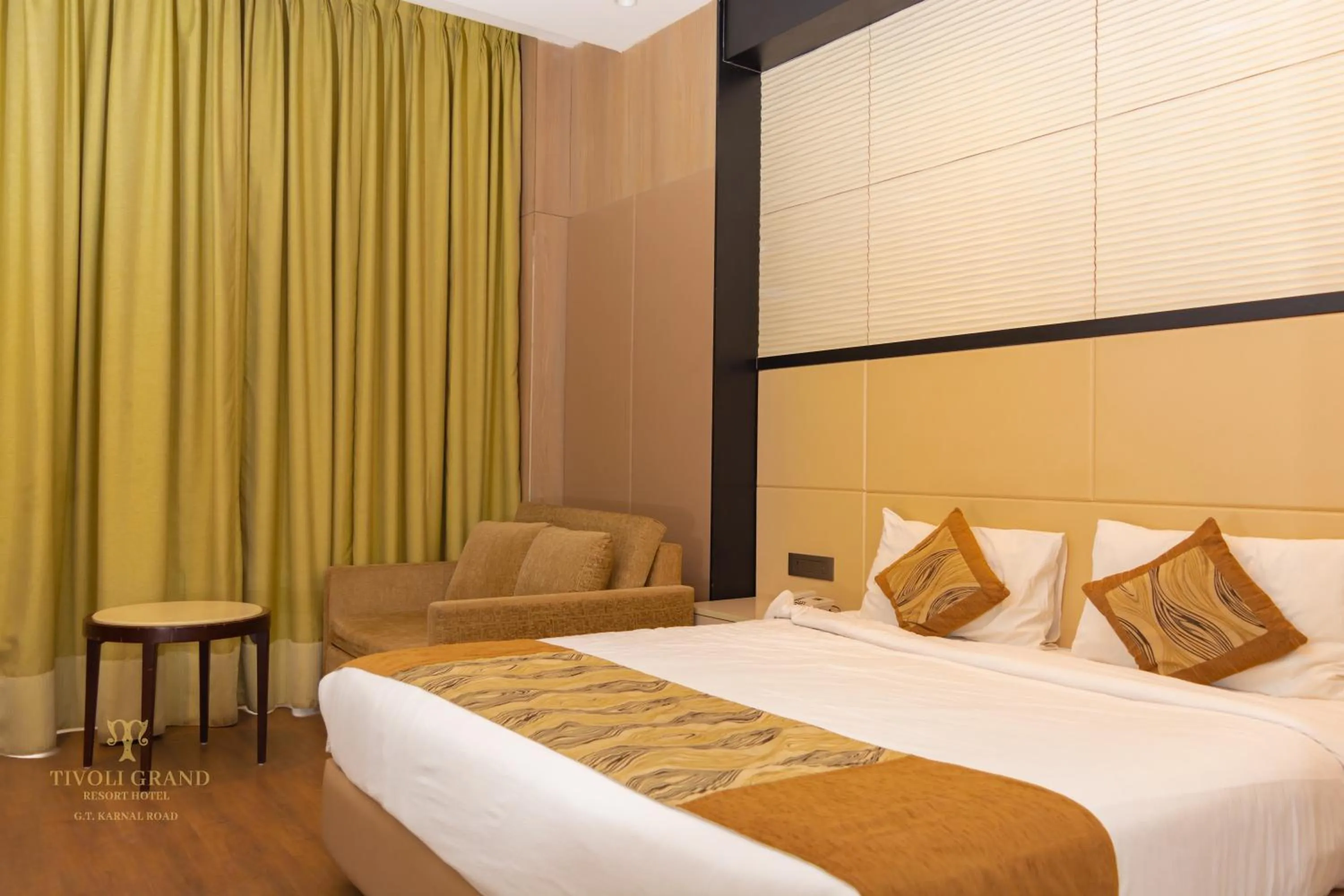 Photo of the whole room, Bed in Tivoli Garden Resort