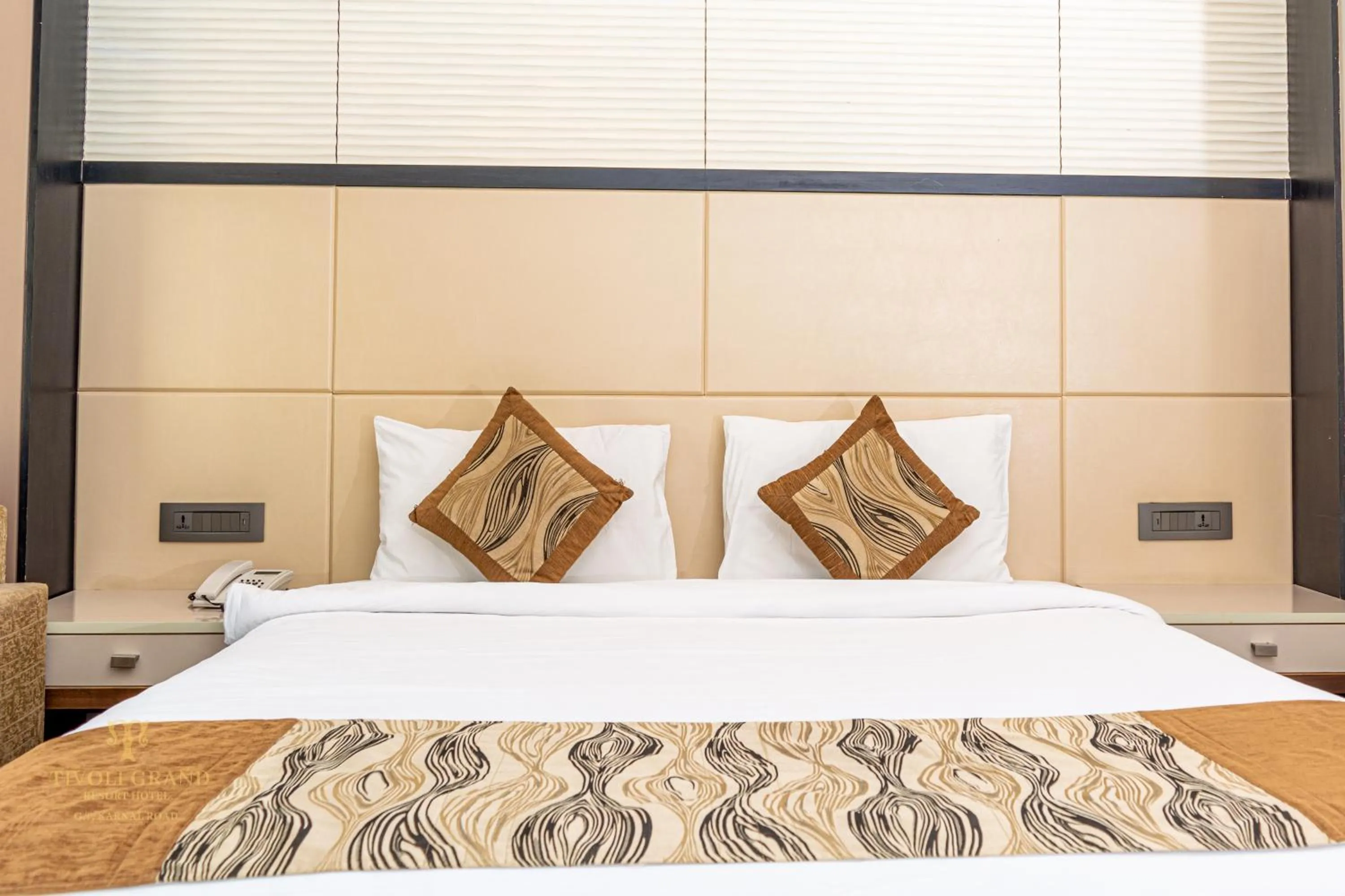 Bed in Tivoli Garden Resort