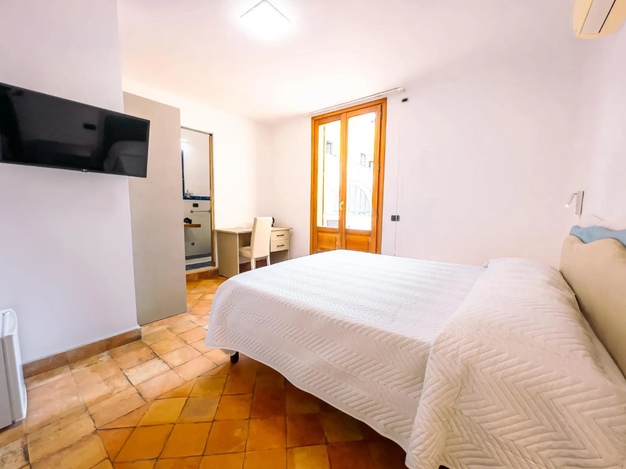 Photo of the whole room, Bed in Residenza Ester