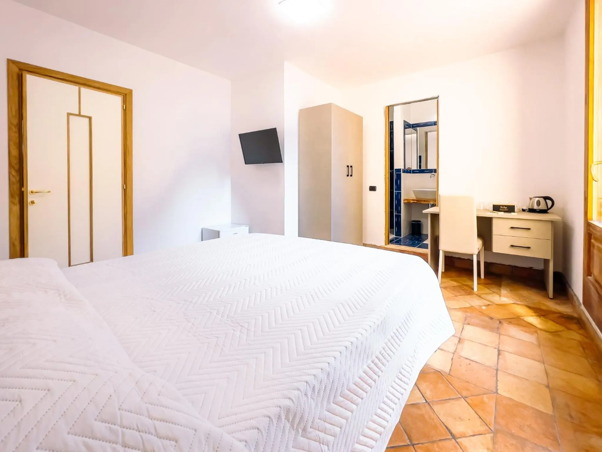 Photo of the whole room, Bed in Residenza Ester