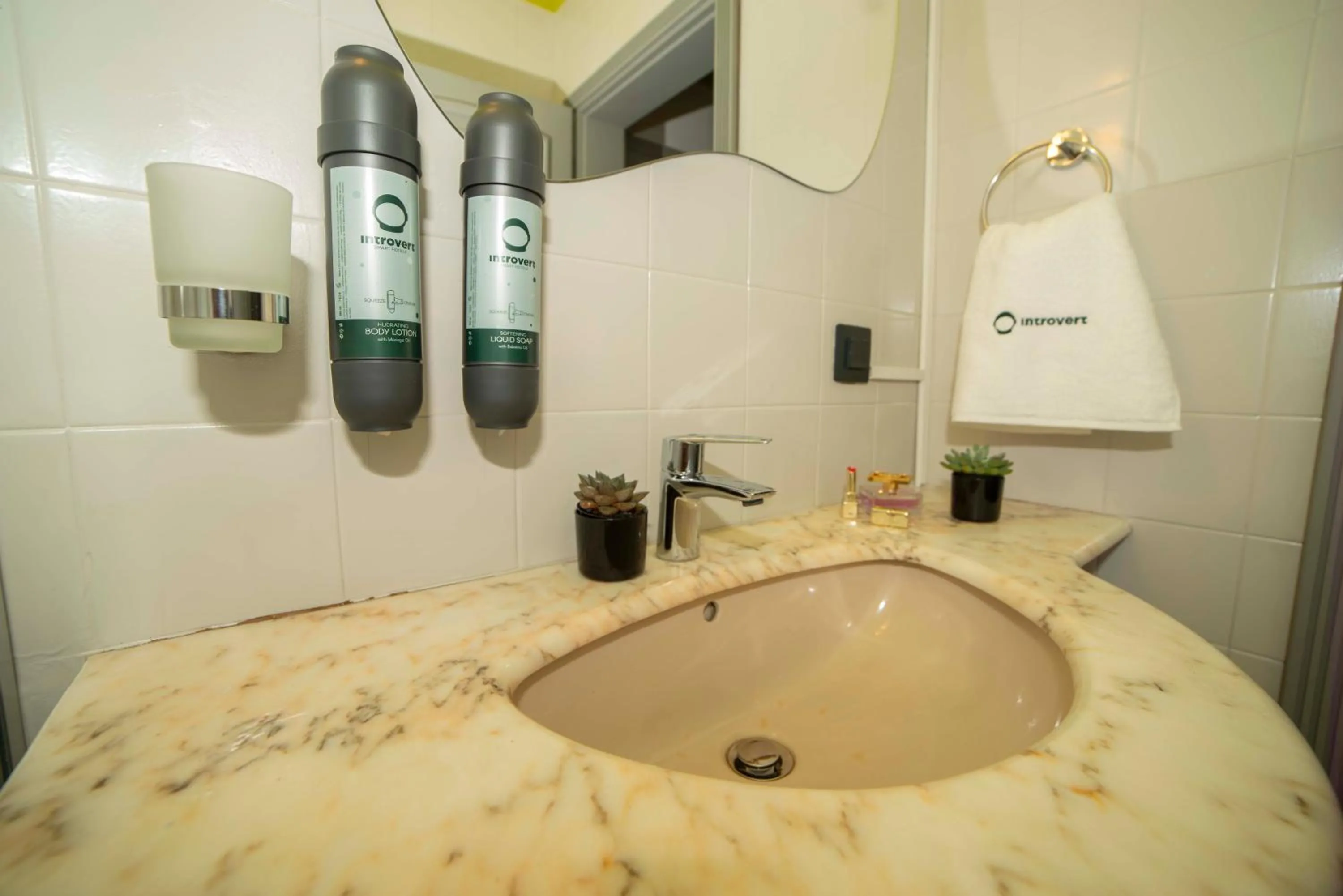 Bathroom in Maria Luisa by INTROVERT HOTELS