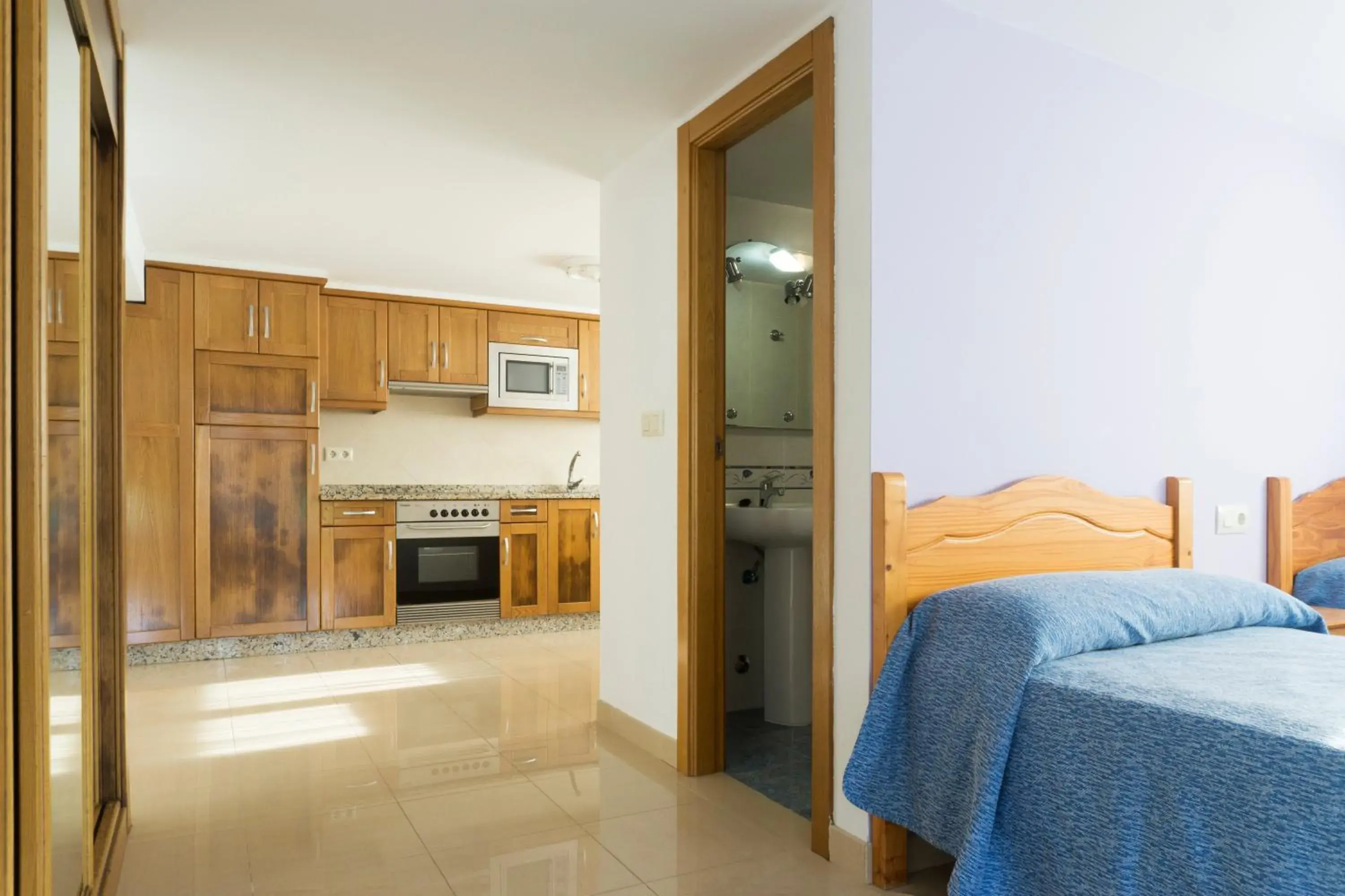 Kitchen or kitchenette, Bed in Casa Codesal Apartamentos Kitchen or kitchenette, Bed in Casa Codesal Apartamentos