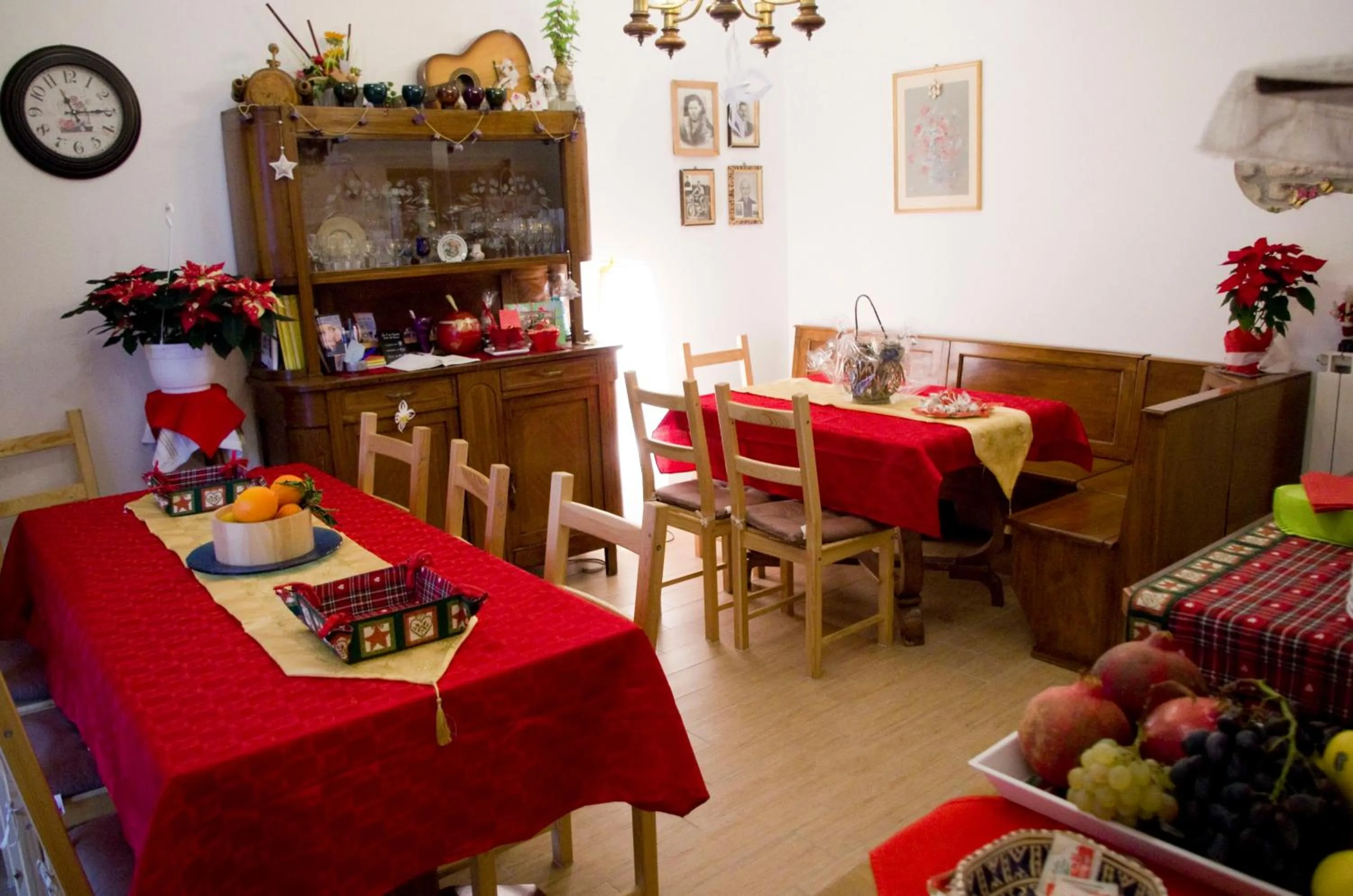 Communal lounge/ TV room in B&B dai Carari