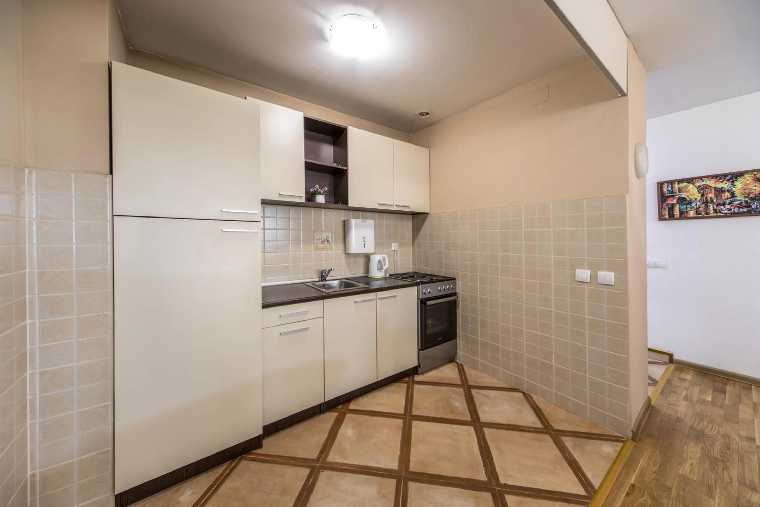 Kitchen or kitchenette in F Apartmani Kragujevac