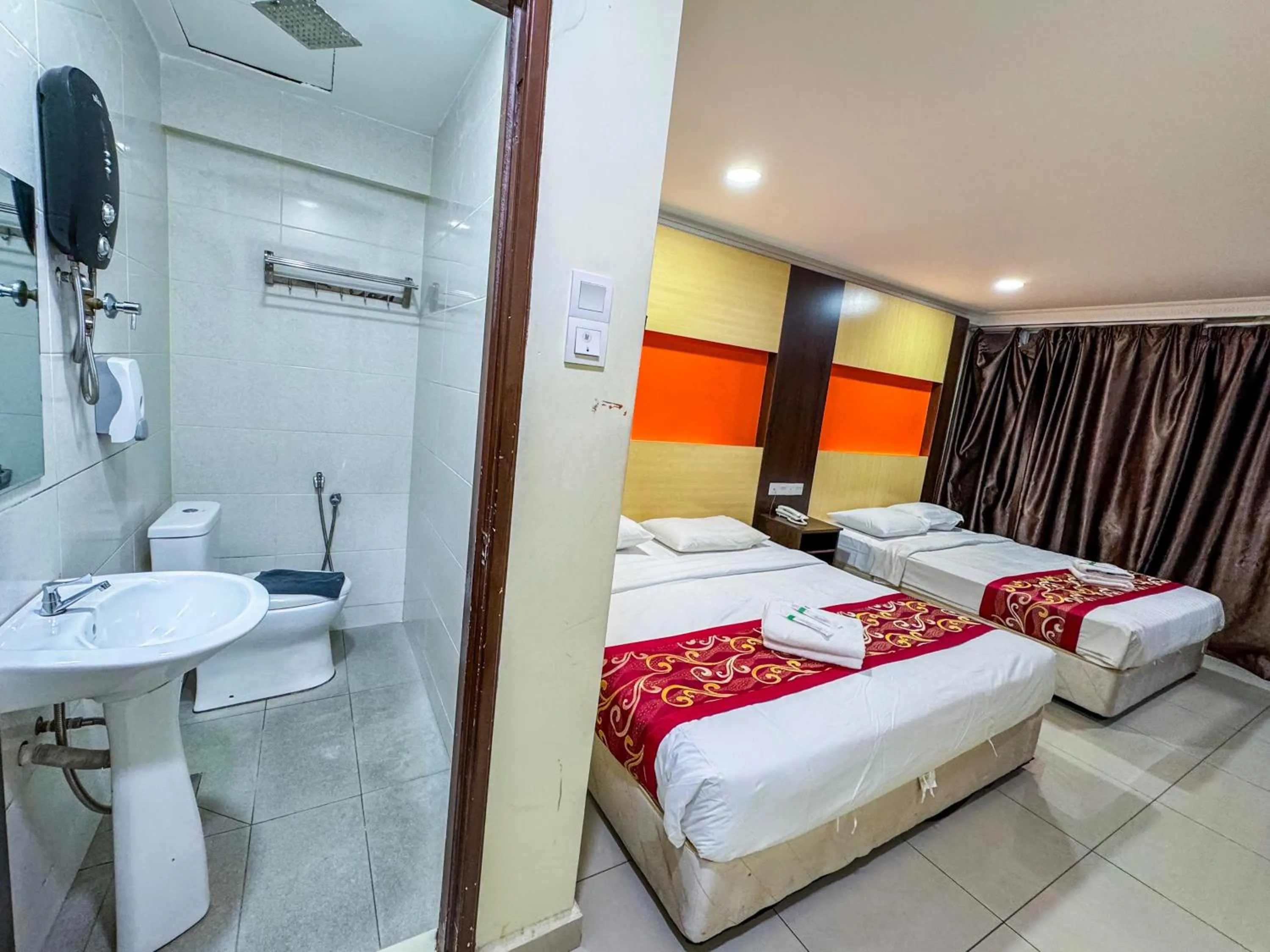 Bed in THE STARION HOTEL BUKIT BINTANG