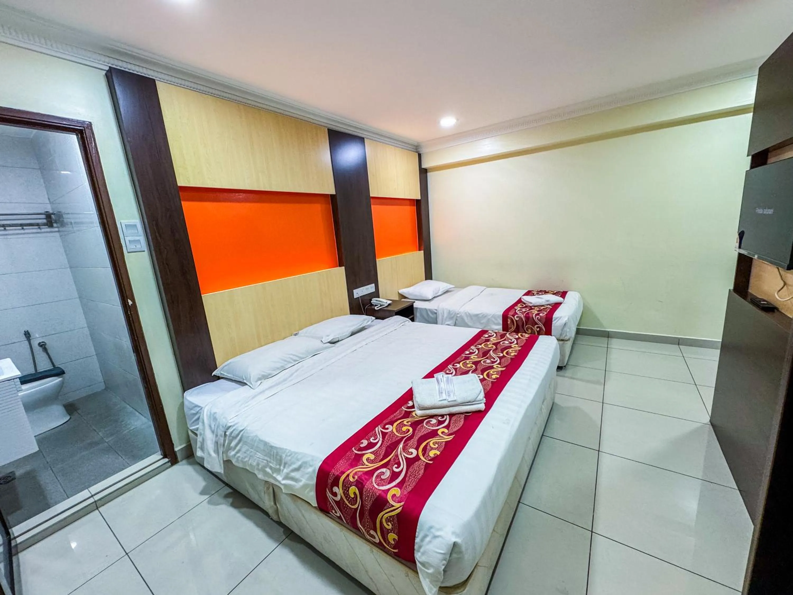 Bed in THE STARION HOTEL BUKIT BINTANG