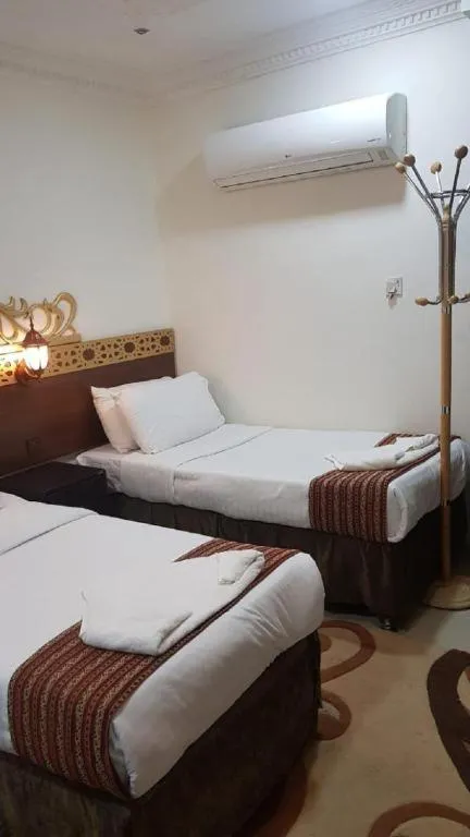 Photo of the whole room, Bed in Al Tawfik Plaza