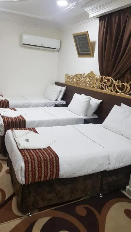 Photo of the whole room, Bed in Al Tawfik Plaza