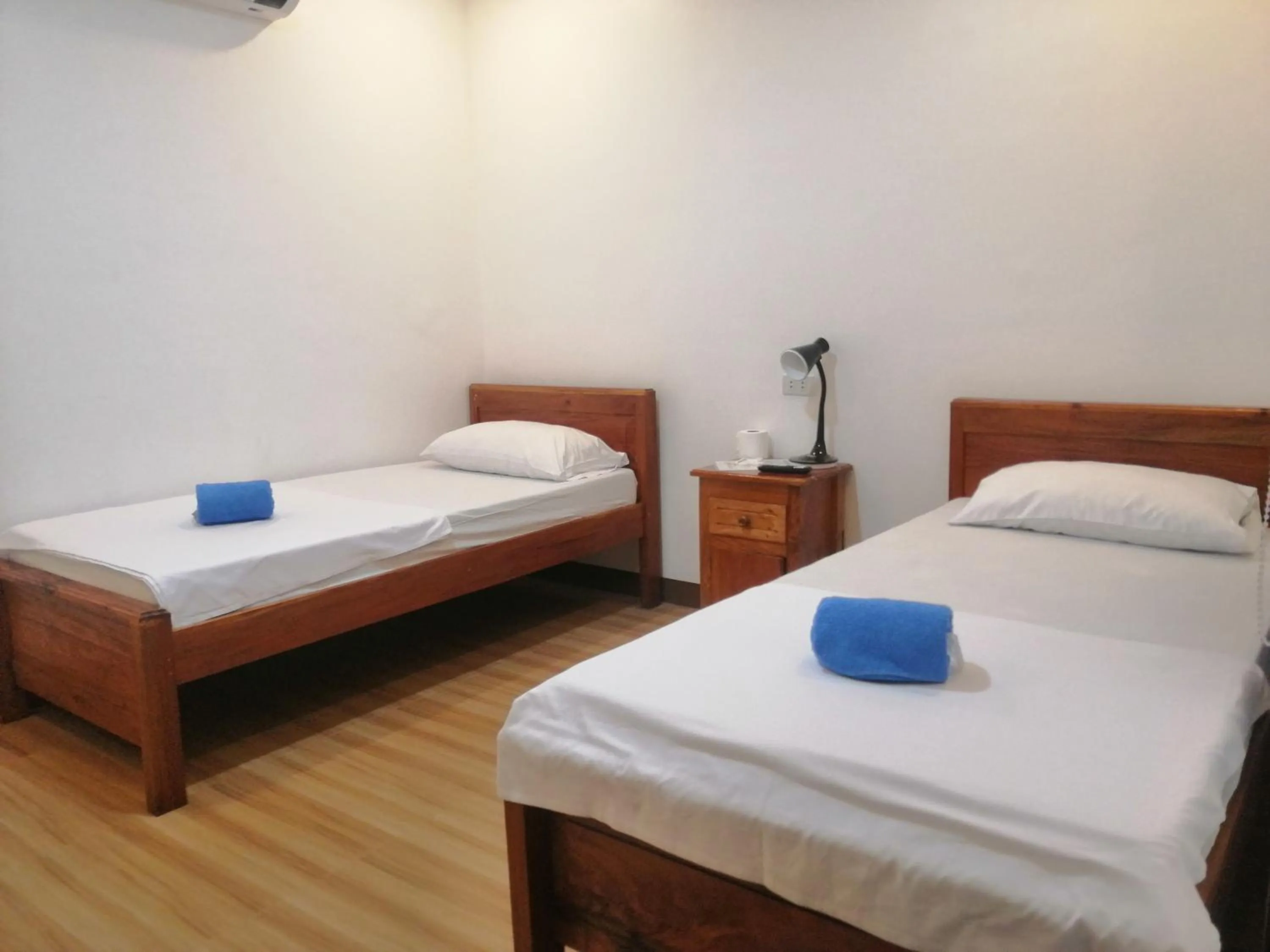 Bed in Baki Divers and Beach Resort