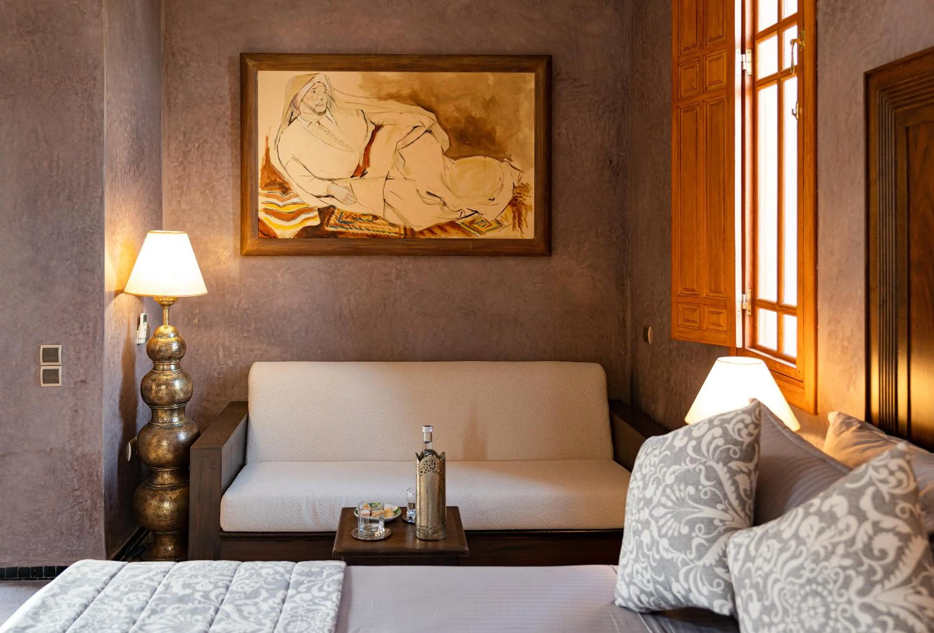 Seating area, Bed in Palais Alcazar