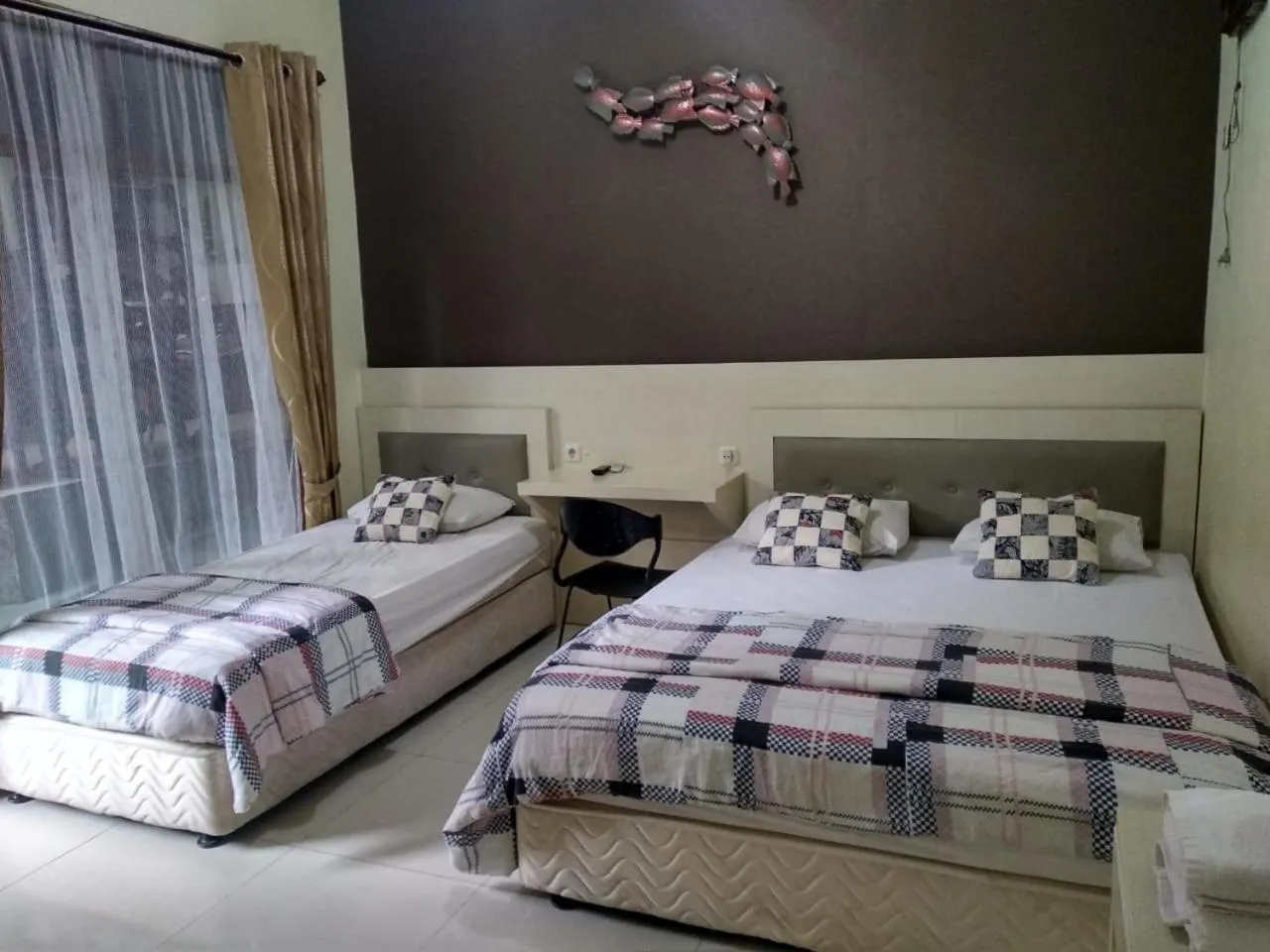 Bed in Enny's Guest House