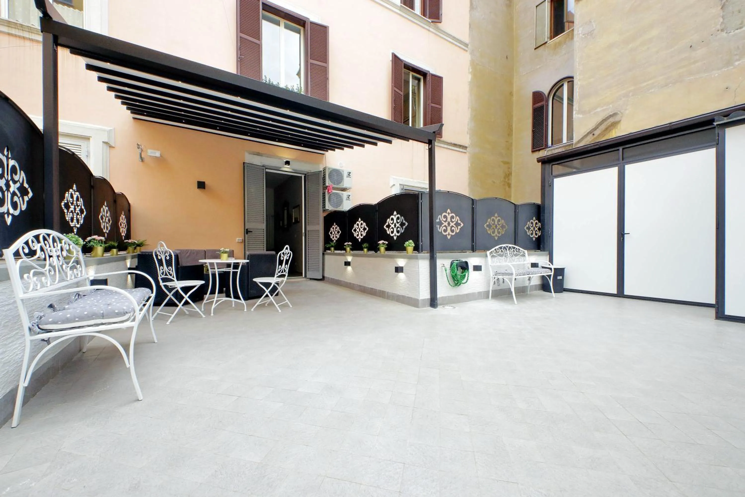 Property building in Roman Holiday Suites