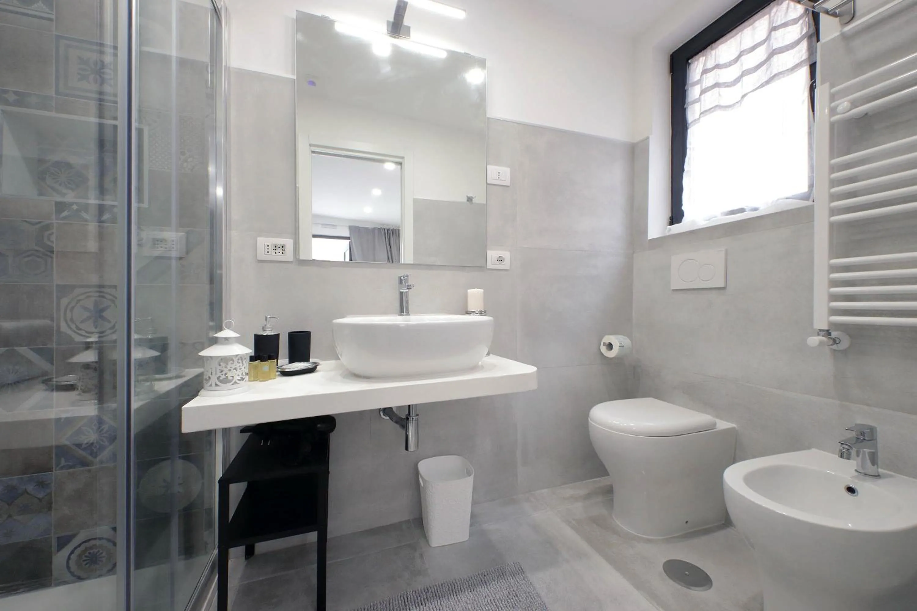 Bathroom in Roman Holiday Suites