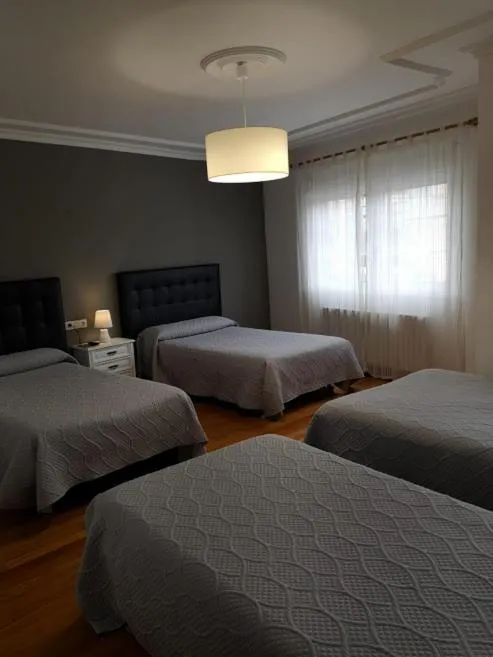 Bed in Pensión Albergue A Pedra