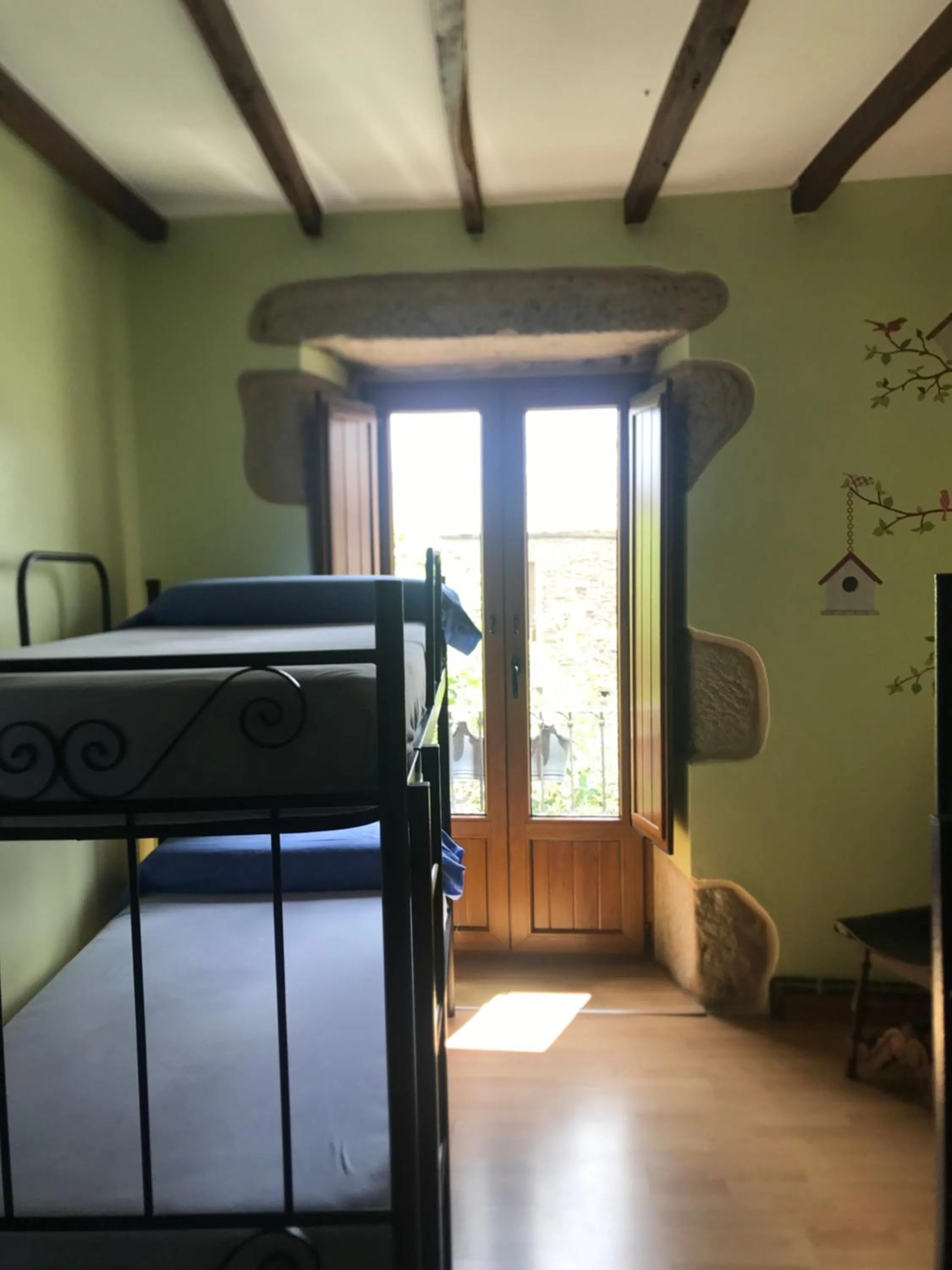 Bed in Pensión Albergue A Pedra