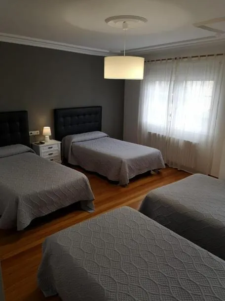Bed in Pensión Albergue A Pedra