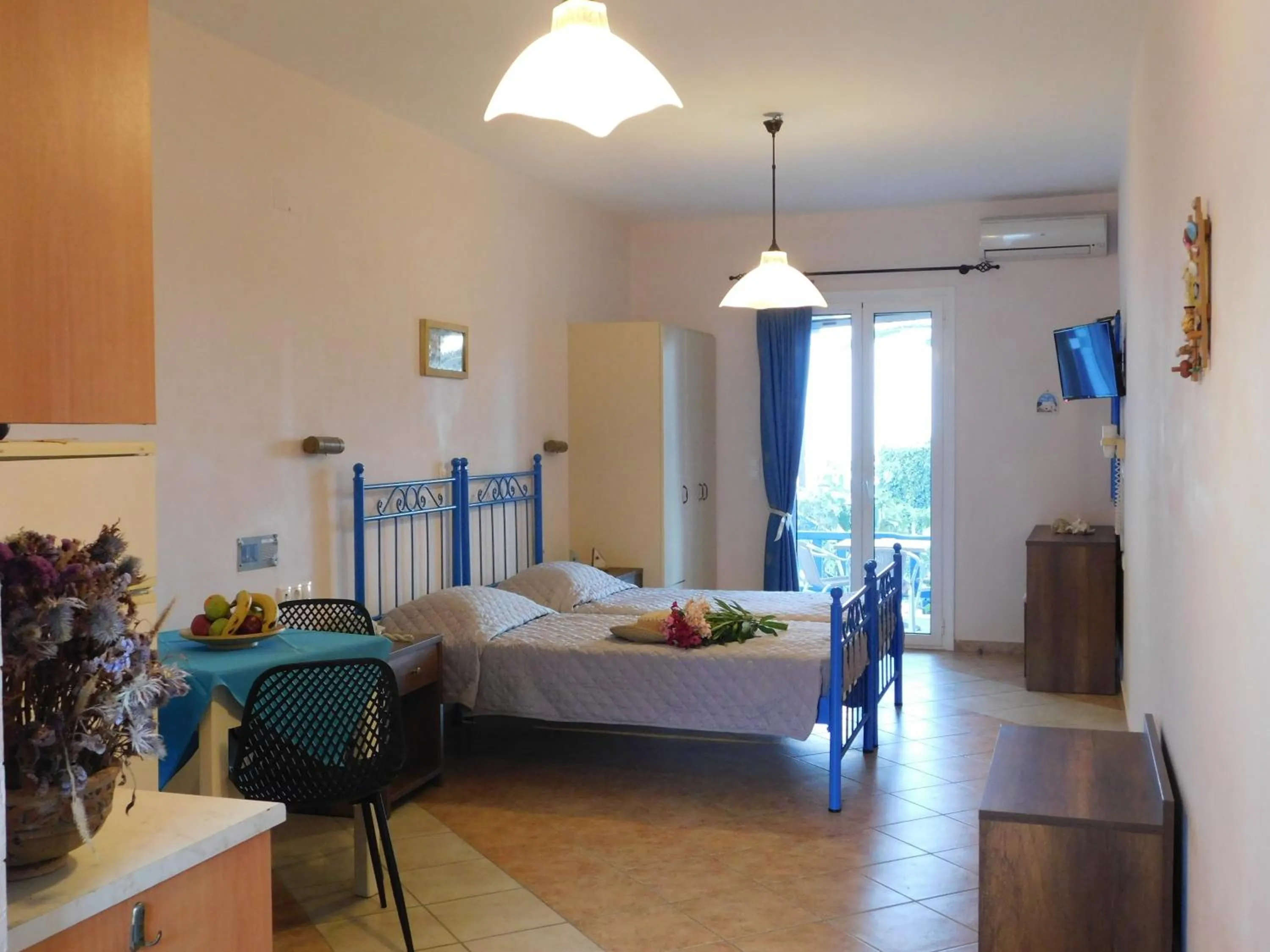 Photo of the whole room, Bed in Akti Aegeou