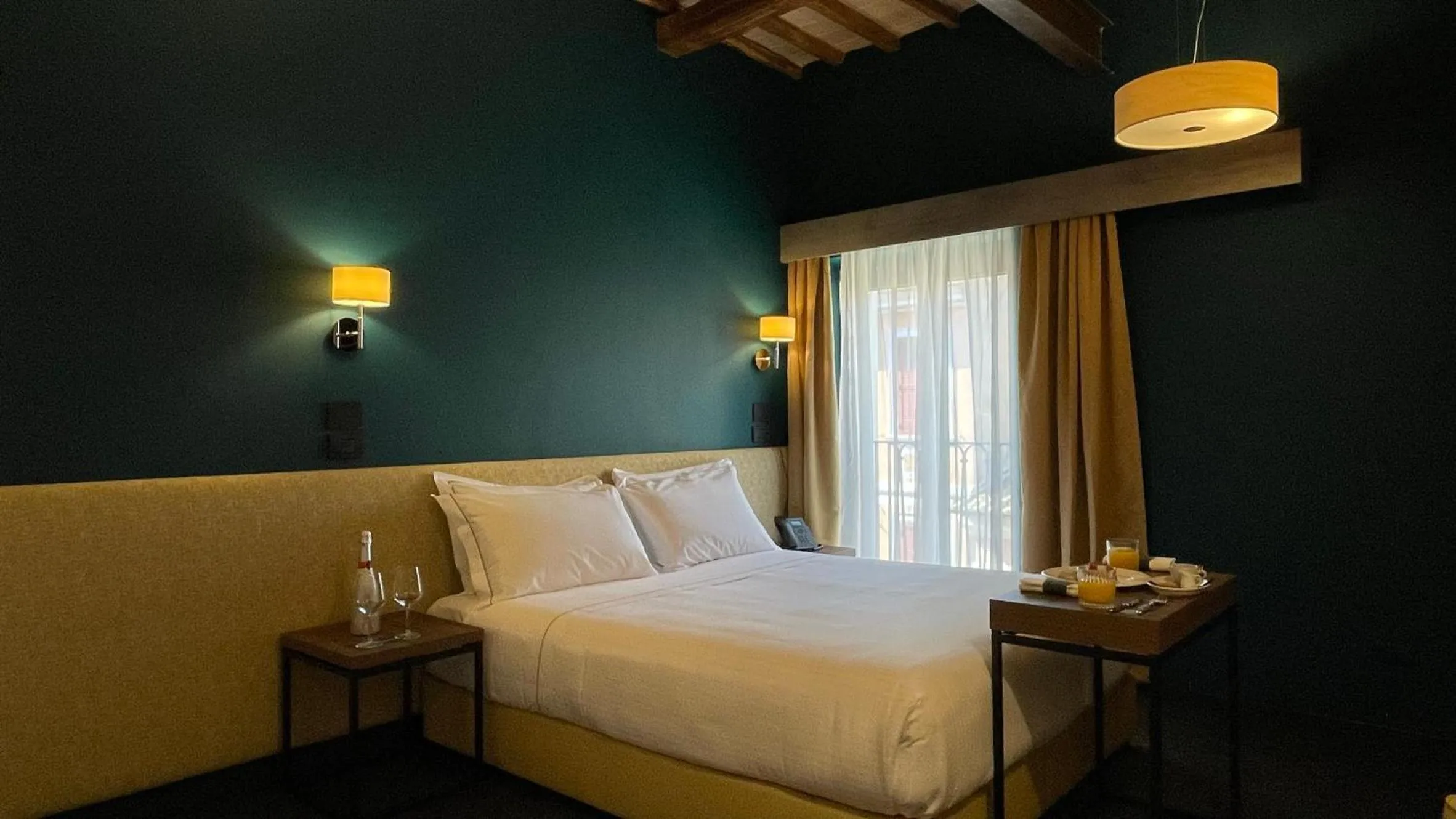 Bed in Passpartout Boutique Palace