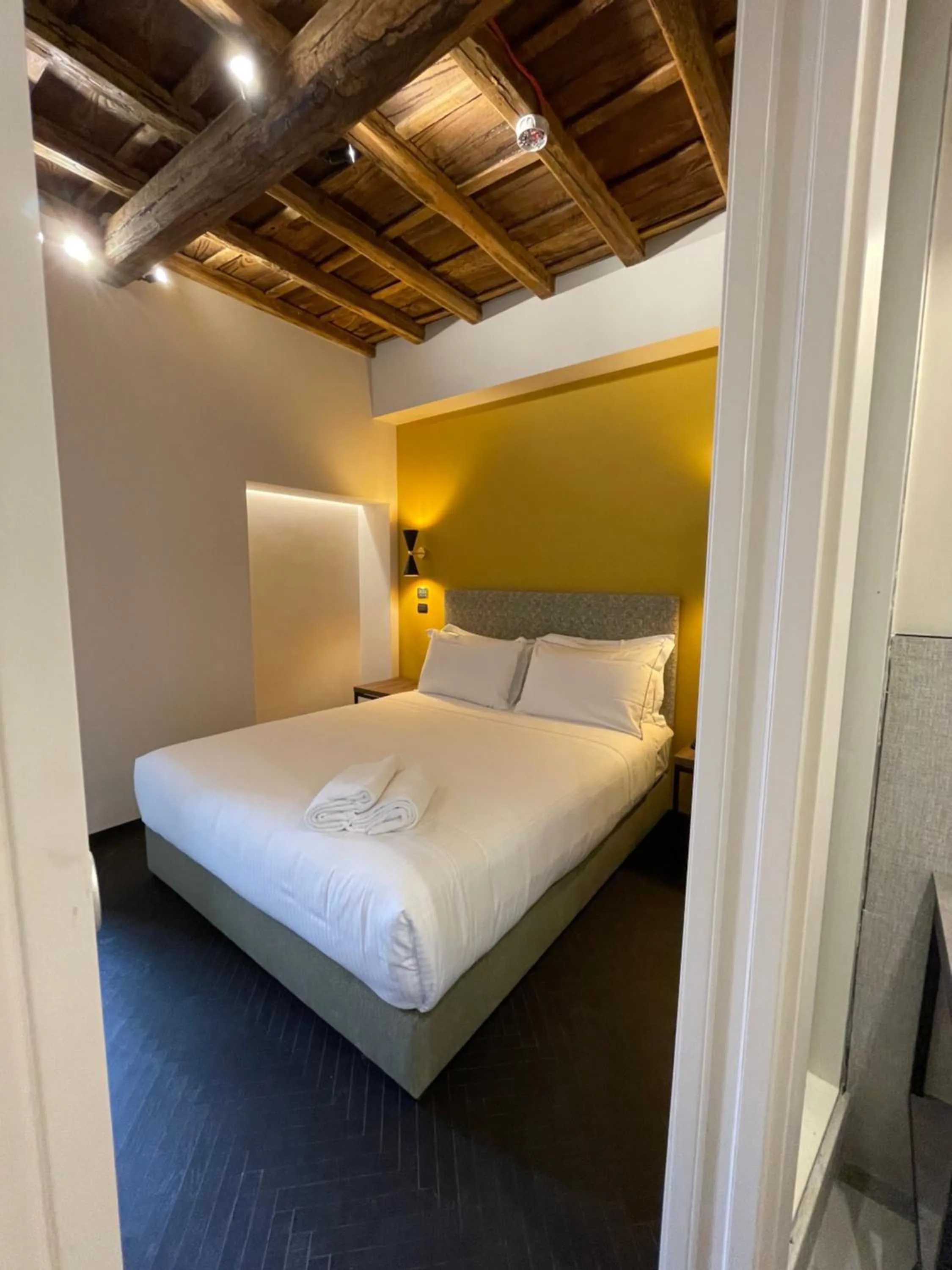 Bed in Passpartout Boutique Palace