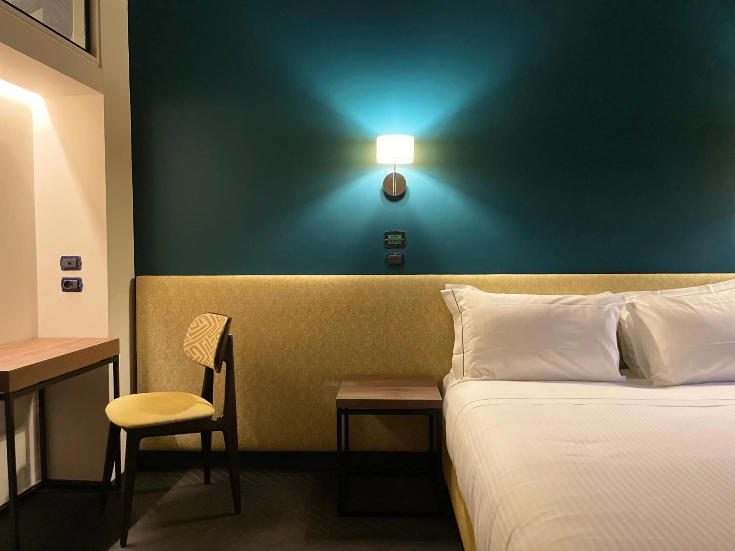 Bed in Passpartout Boutique Palace