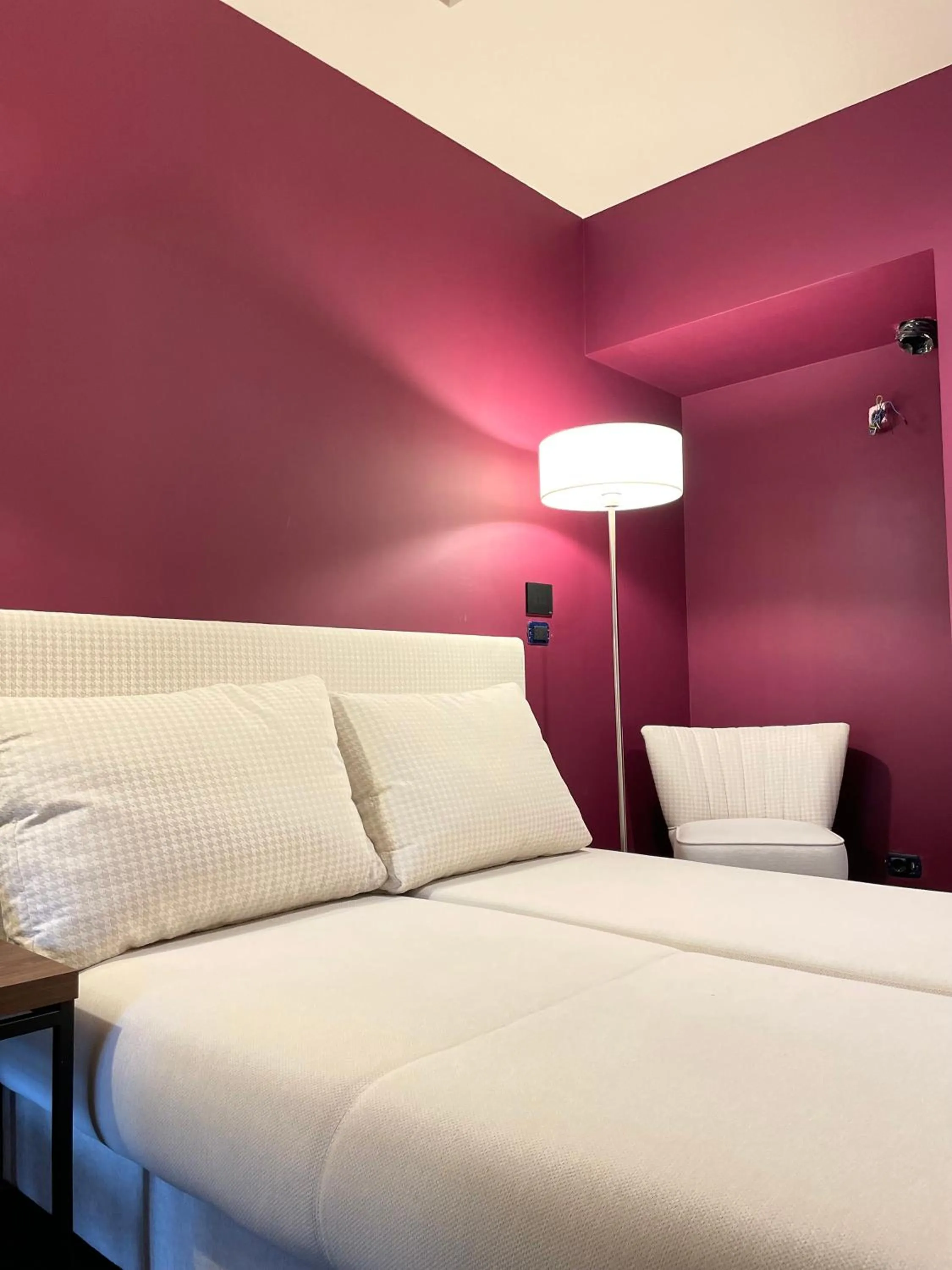 Bed in Passpartout Boutique Palace