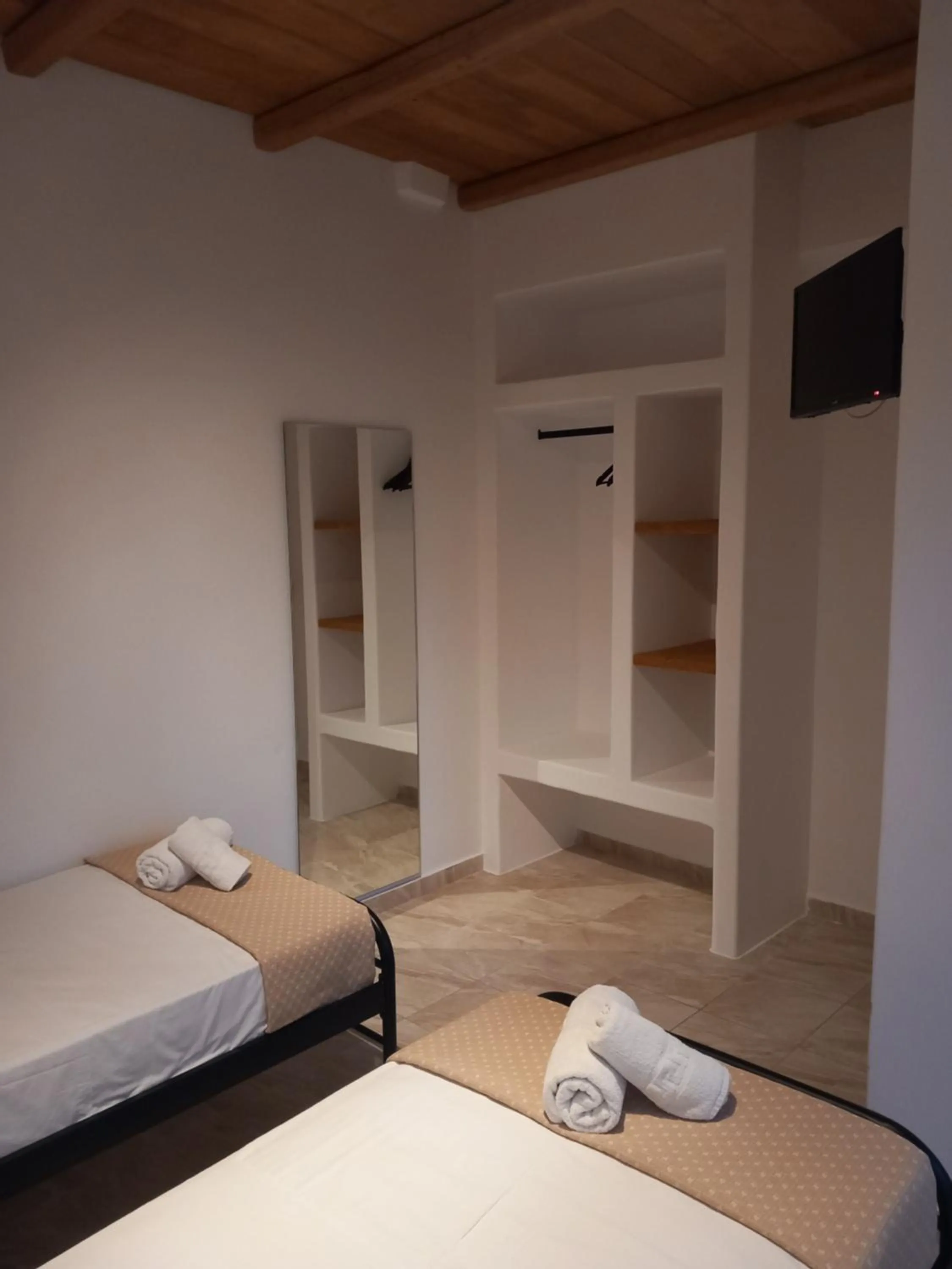 Bed in Miltiadis Apartments