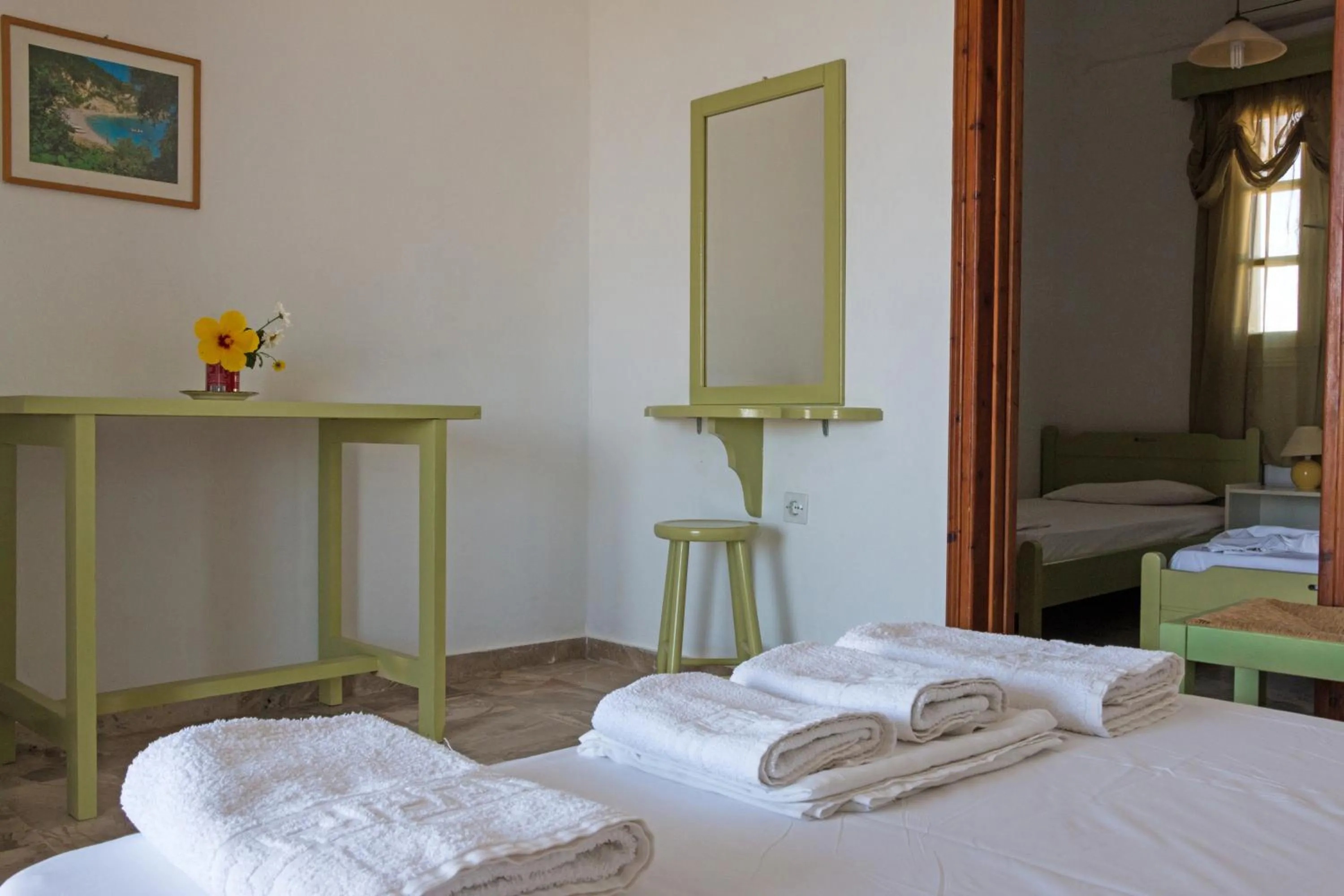 Bed in Miltiadis Apartments