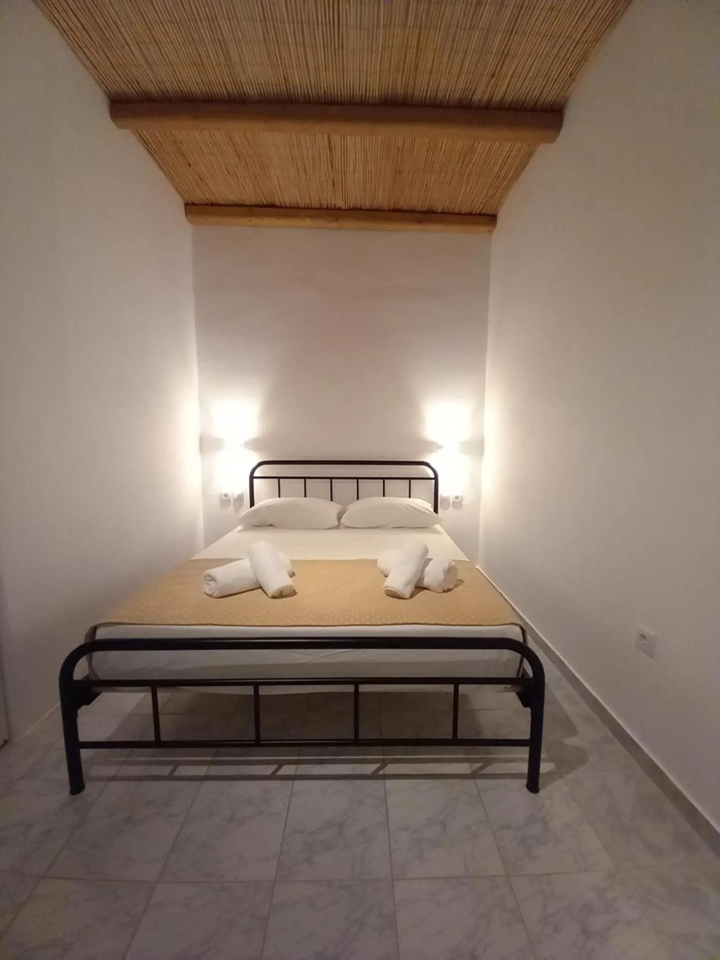 Bed in Miltiadis Apartments