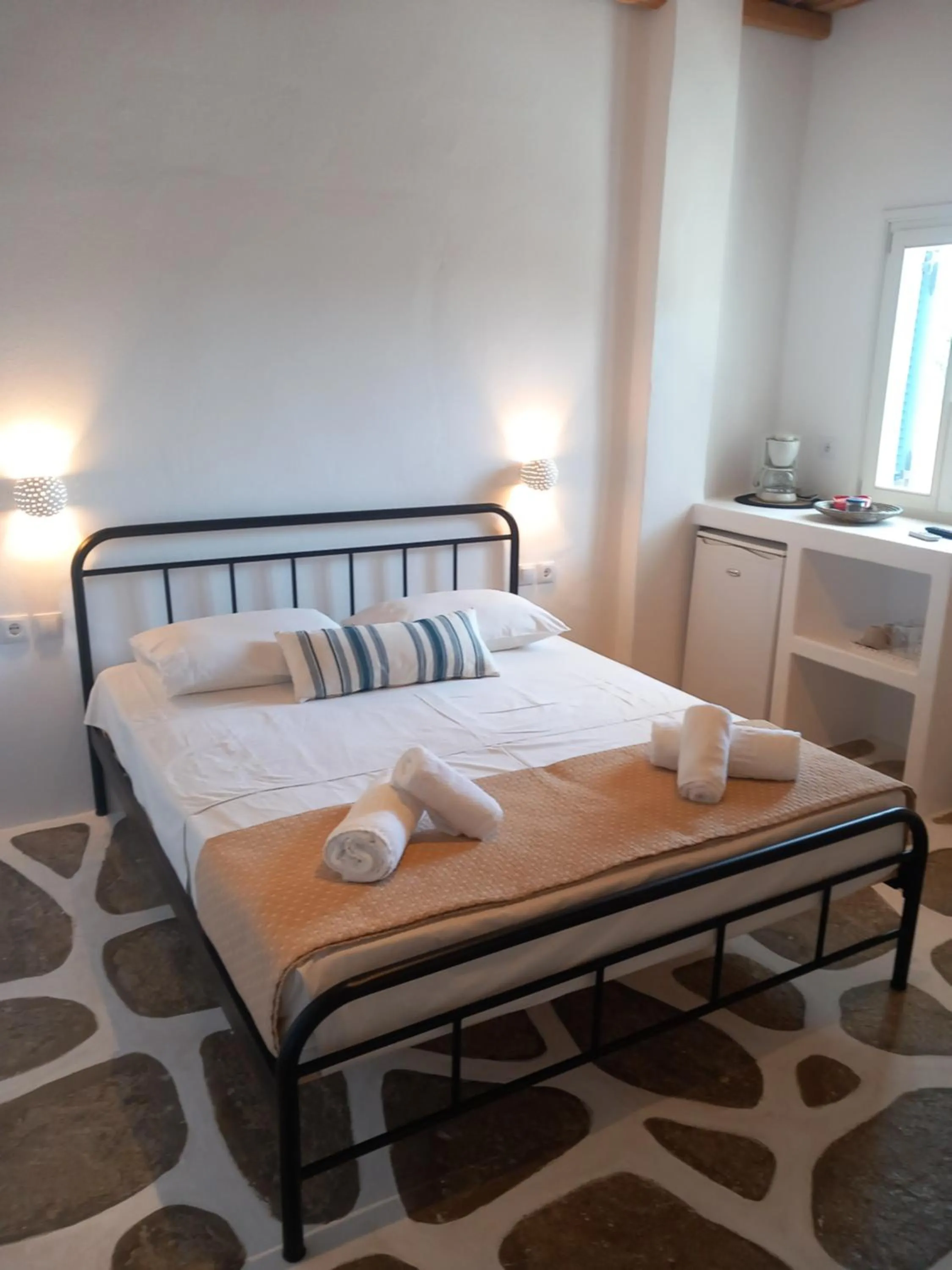 Bed in Miltiadis Apartments