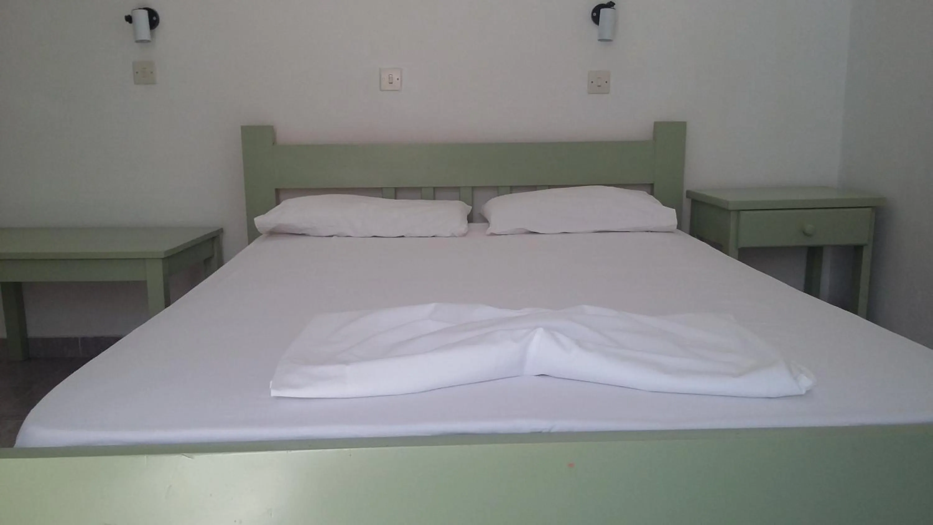 Bed in Miltiadis Apartments