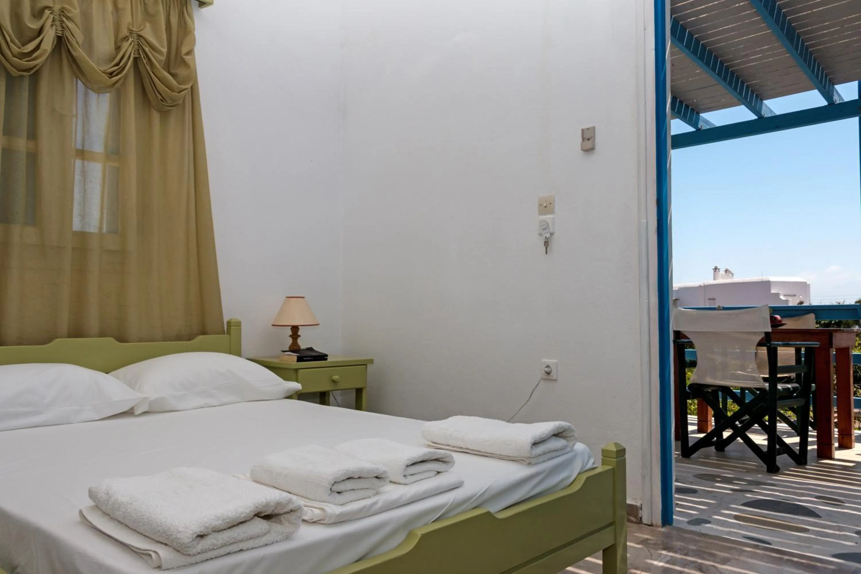 Bed in Miltiadis Apartments