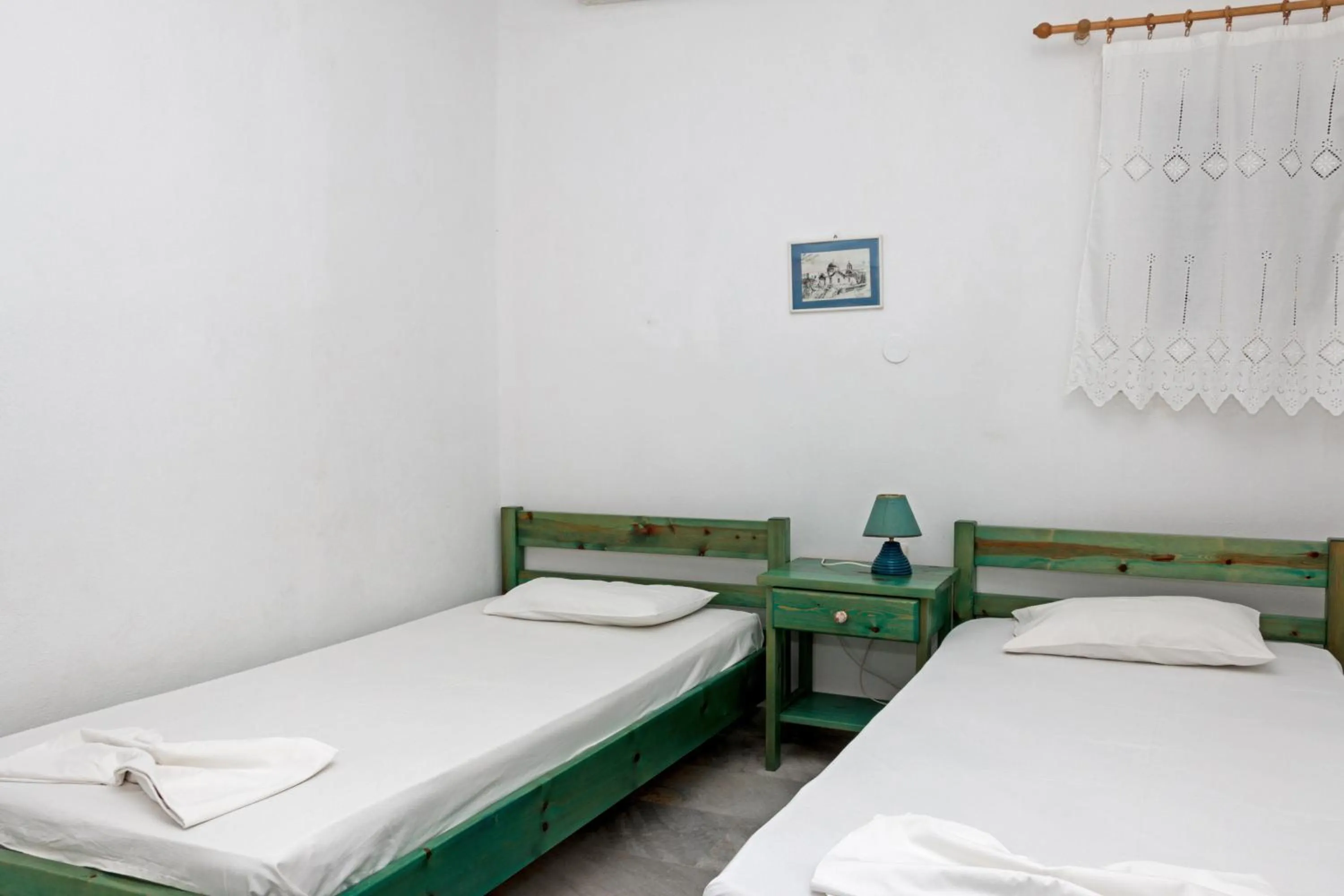 Bed in Miltiadis Apartments
